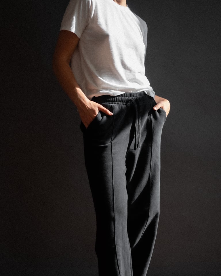 The Gioia wide-leg sweatpants in essential black on model, organic cotton fleece