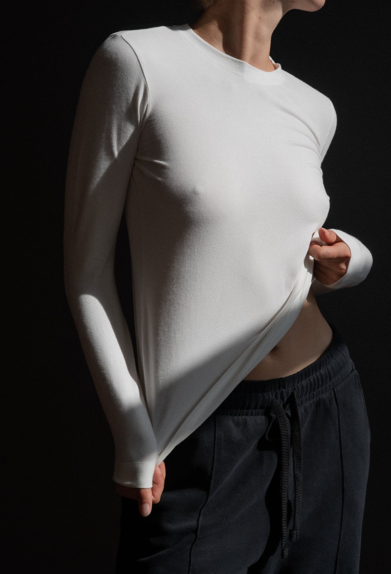 The Nora fitted long sleeve in off-white on model, organic cotton with stretch