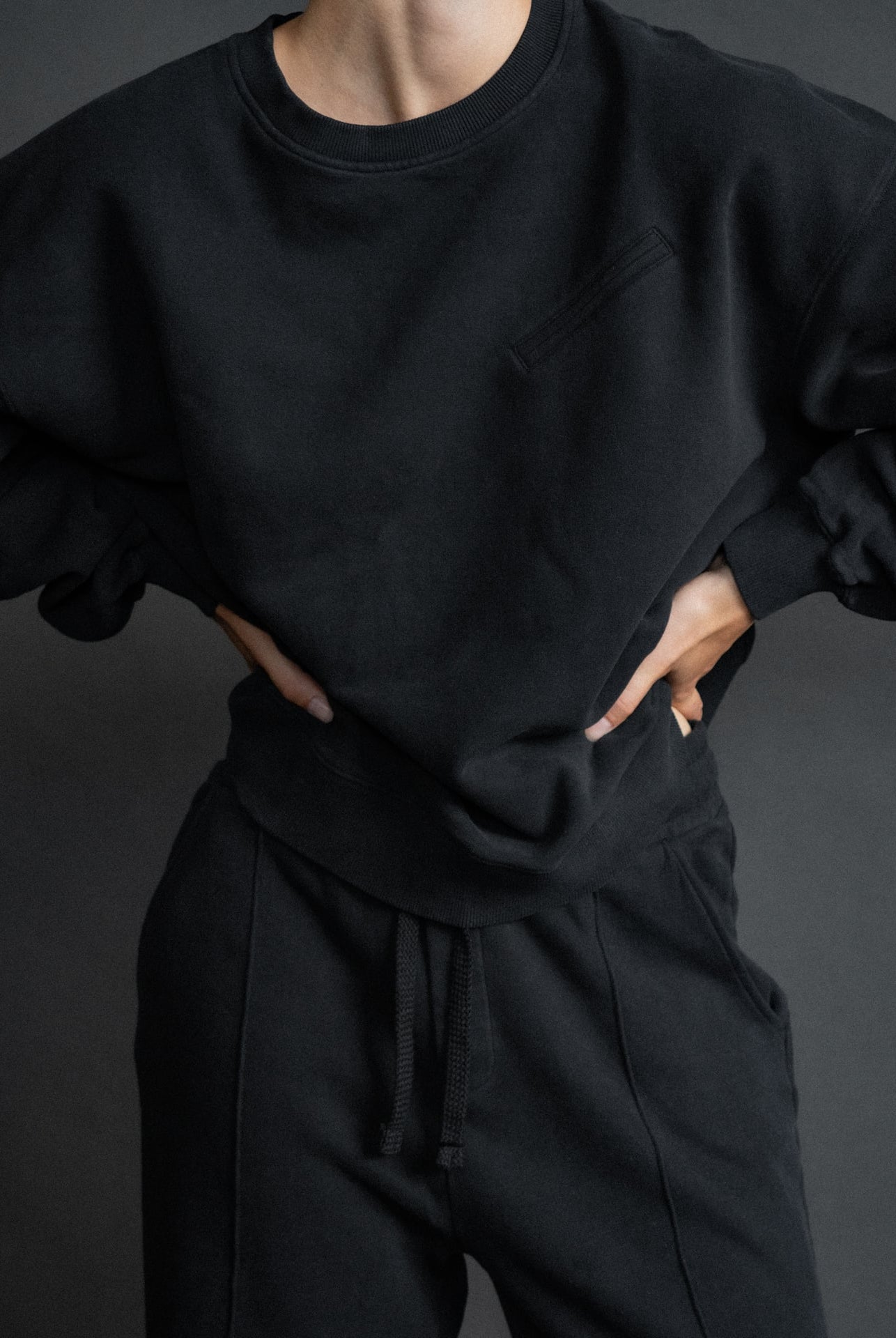 The Hannah oversized sweatshirt in essential black on model, organic cotton fleece