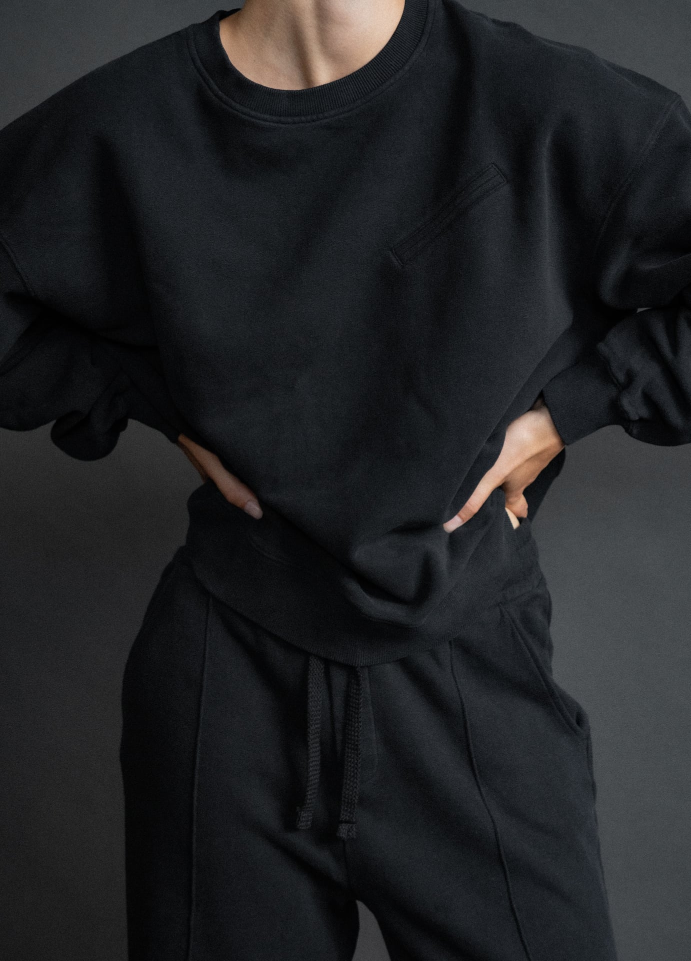 The Hannah oversized sweatshirt in essential black on model, organic cotton fleece