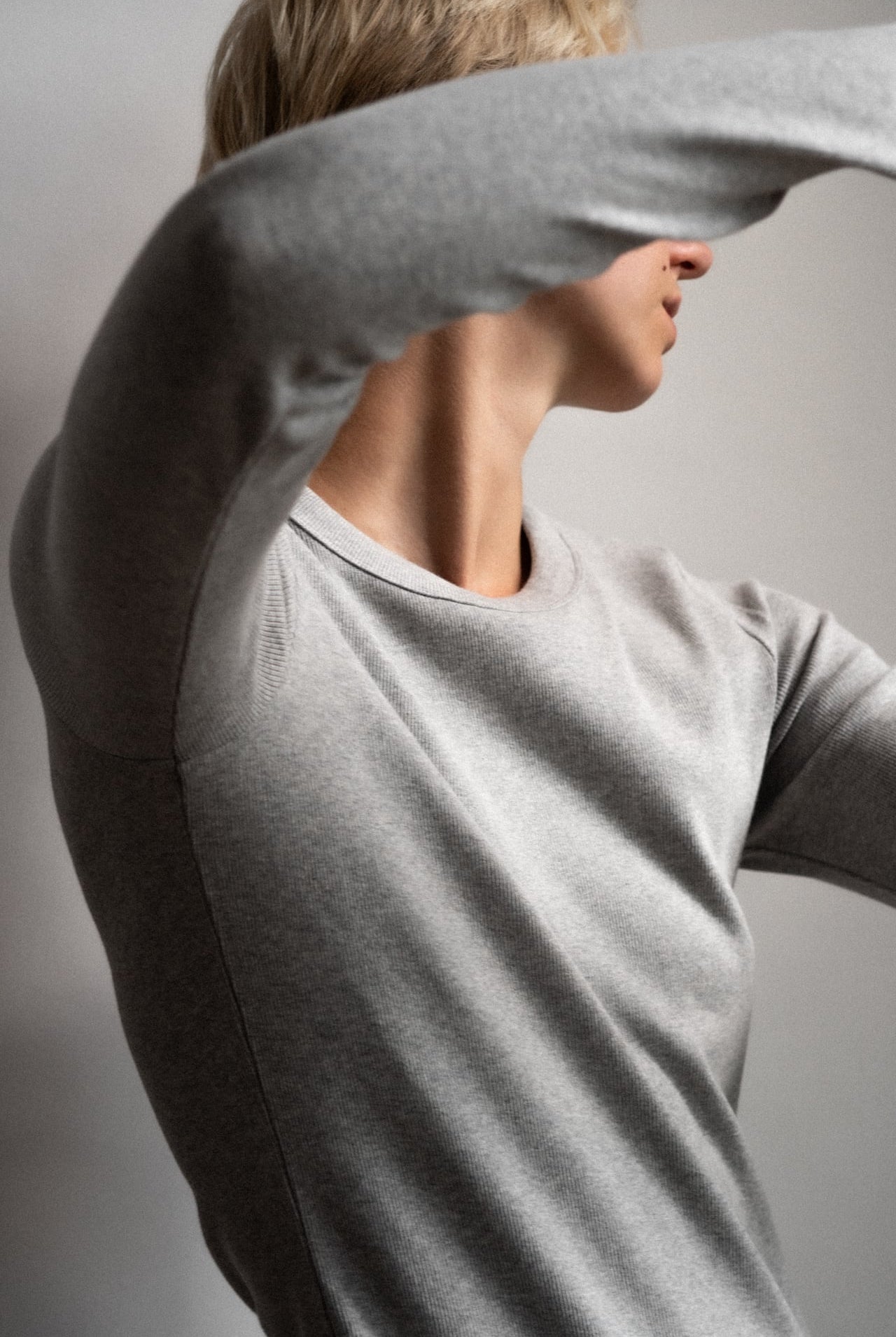 The Ella Grey Melange long sleeve top - front view on model