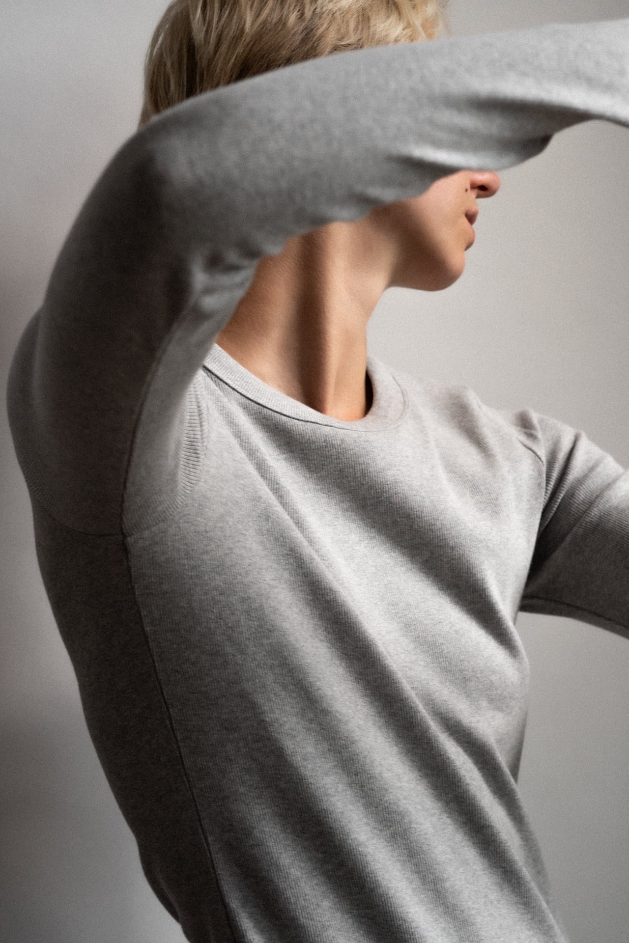 The Ella Grey Melange long sleeve top - front view on model