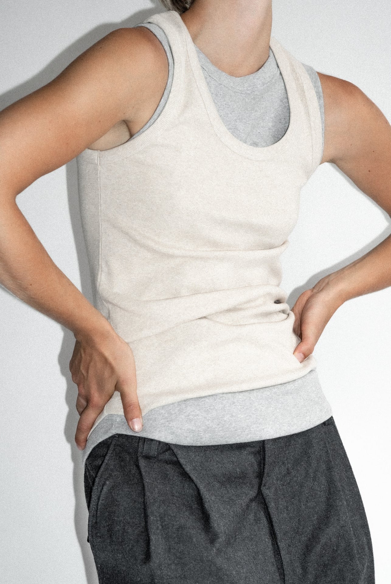 The Josie organic cotton tank top in beige melange, shown on model. GOTS-certified