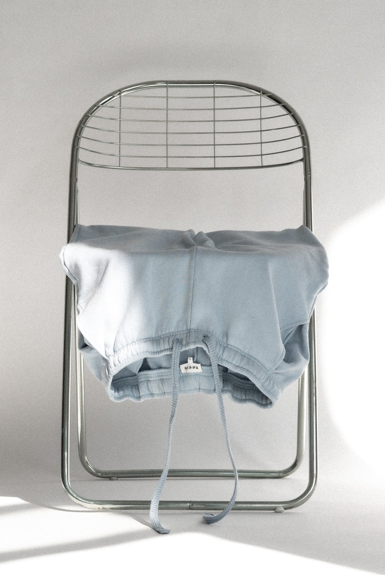 The Abby blue fog sweatpants detail view, drawstring waist, sustainable loungewear