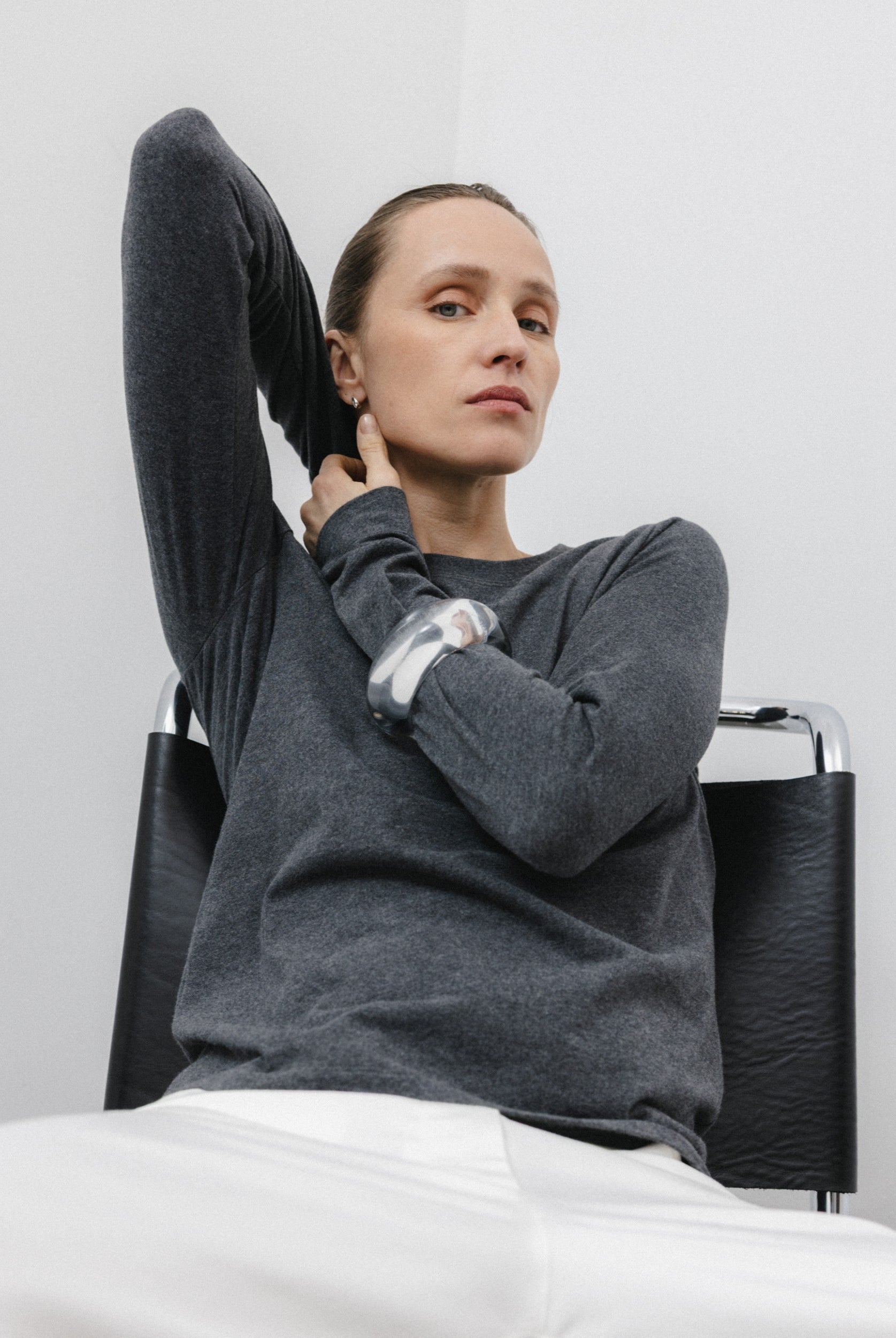 The Nora long sleeve in Anthracite. Made from 95% organic cotton with 5% elastane. Brushed outside. Shown on model view. GOTS