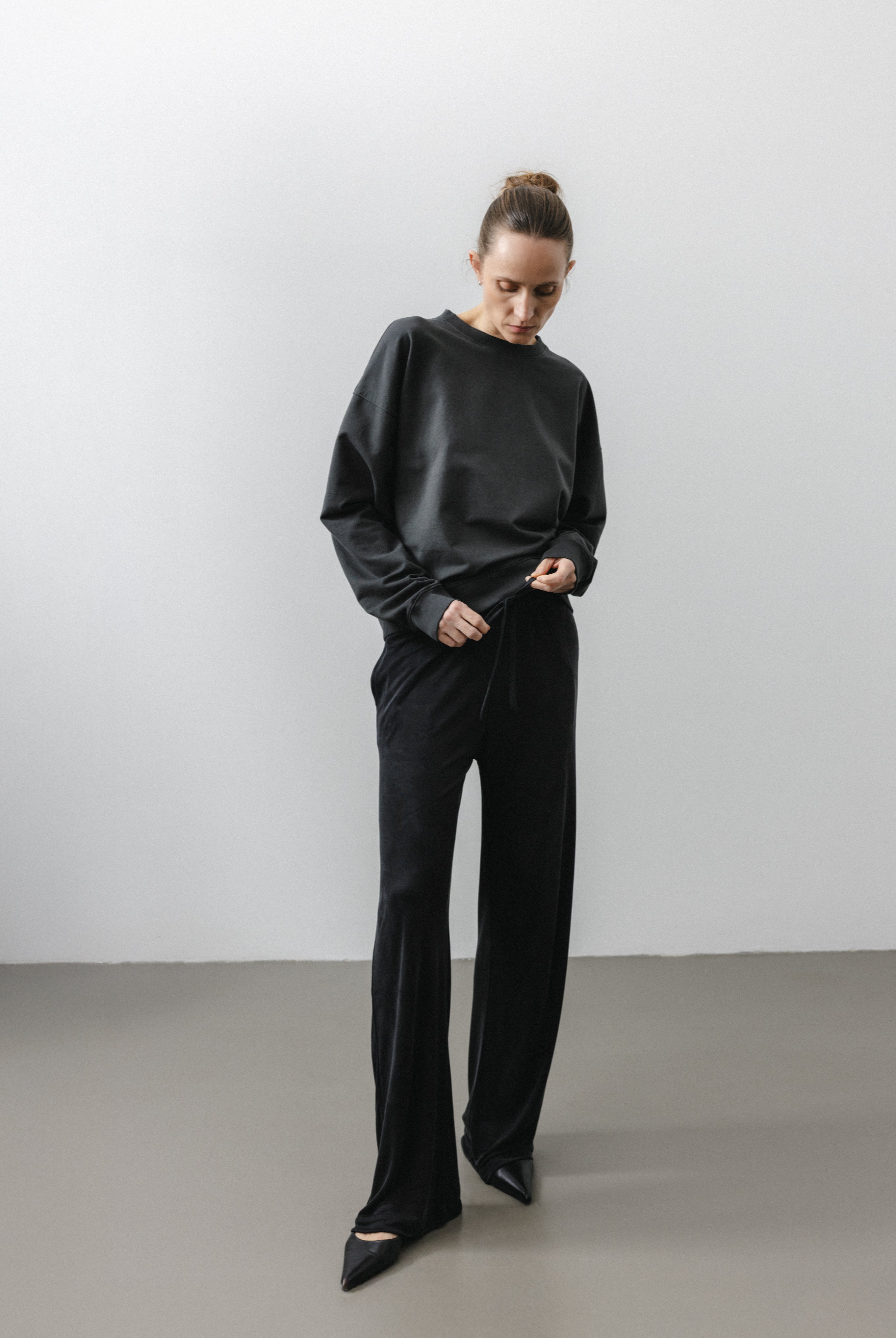 The Sam in Essential Black. 100% Lyocell. Shown on model with The May in Pitch Black.