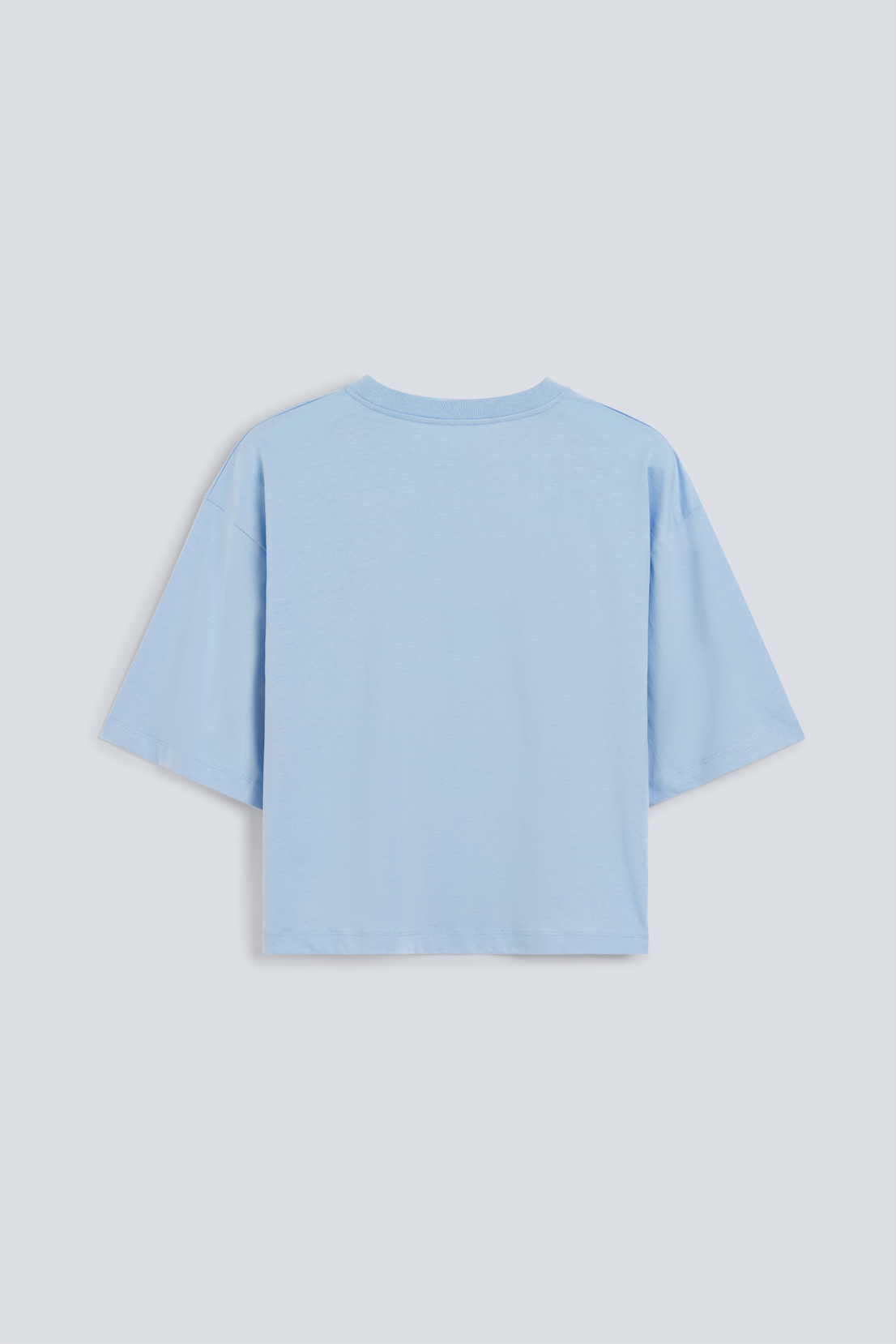 The Talia blue fog tee back view, dropped shoulders and mid-length sleeves, 180g organic cotton made in Portugal