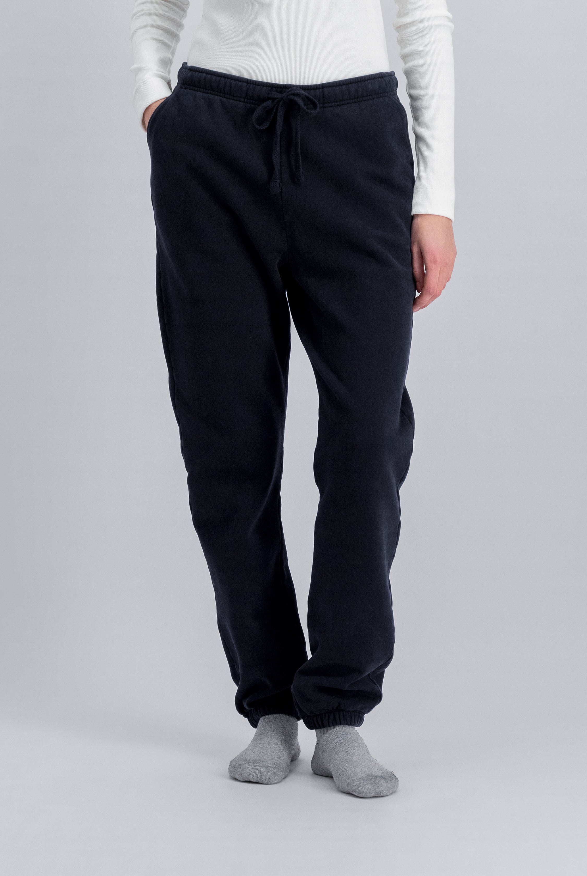 The Abby navy sweatpants front view on model, brushed organic cotton