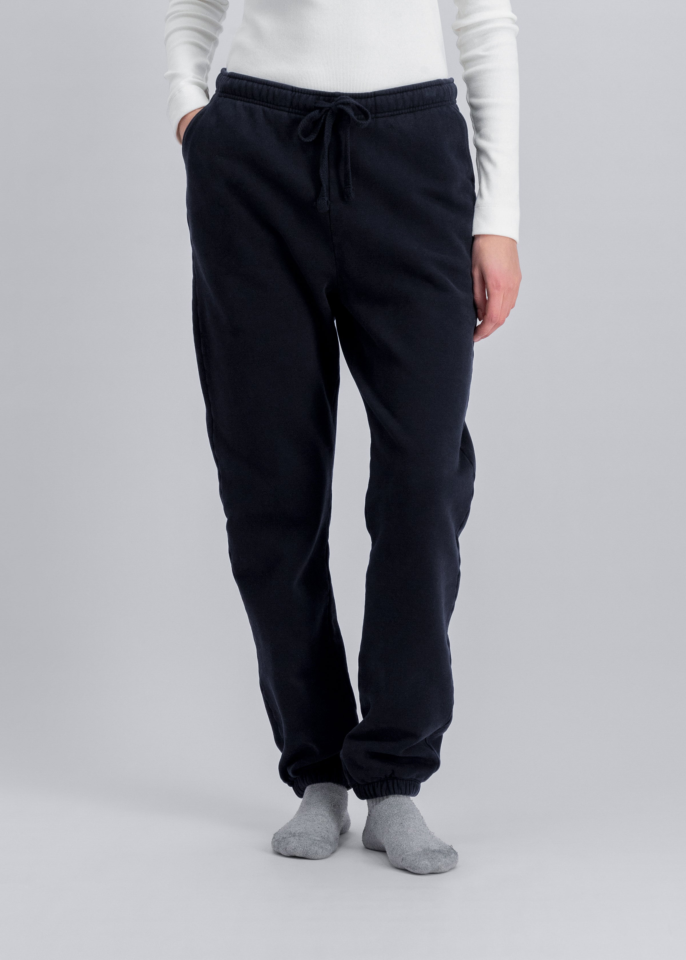 The Abby navy sweatpants front view on model, brushed organic cotton