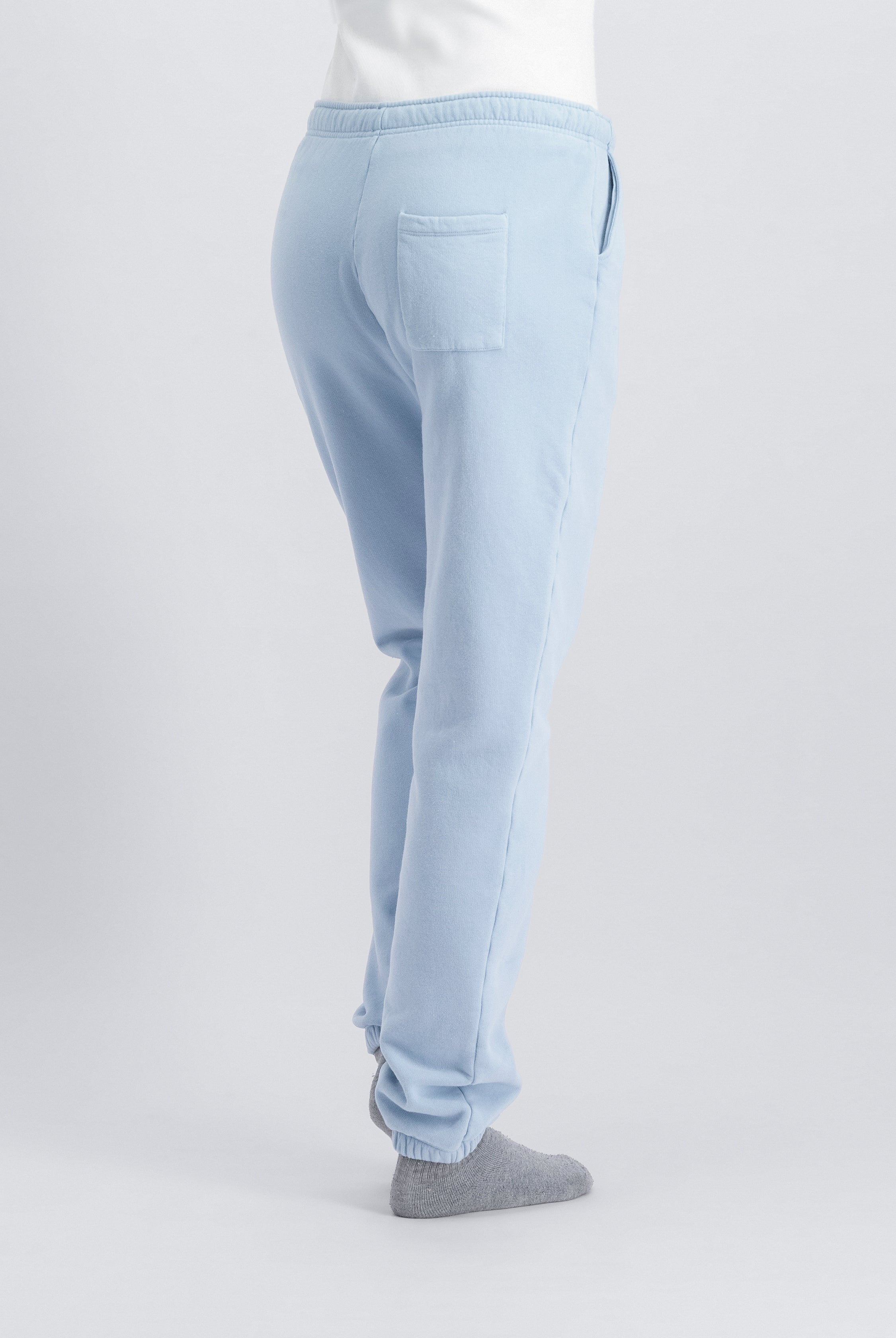 The Abby sweatpants in blue fog back view on model, sustainable loungewear