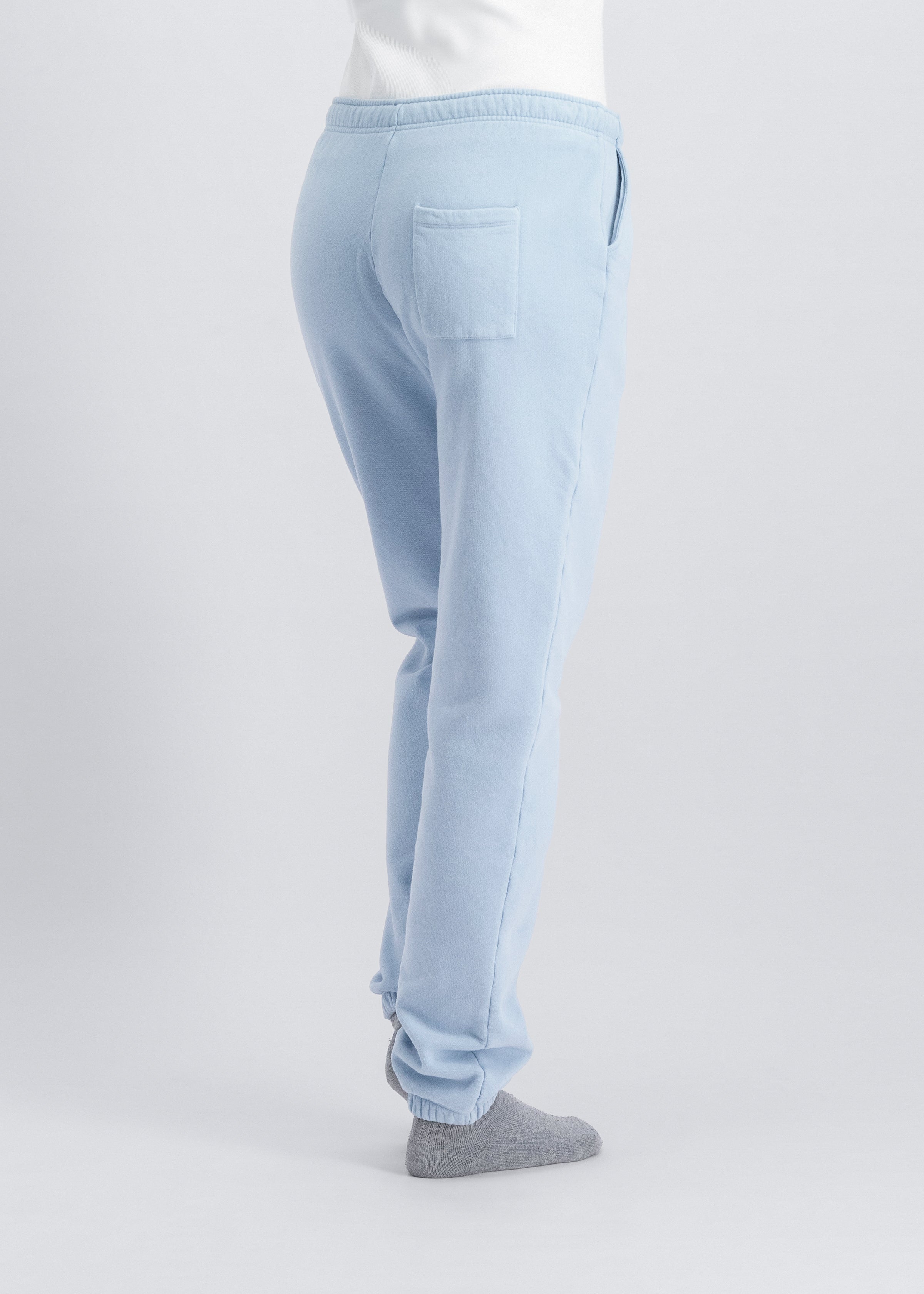 The Abby sweatpants in blue fog back view on model, sustainable loungewear