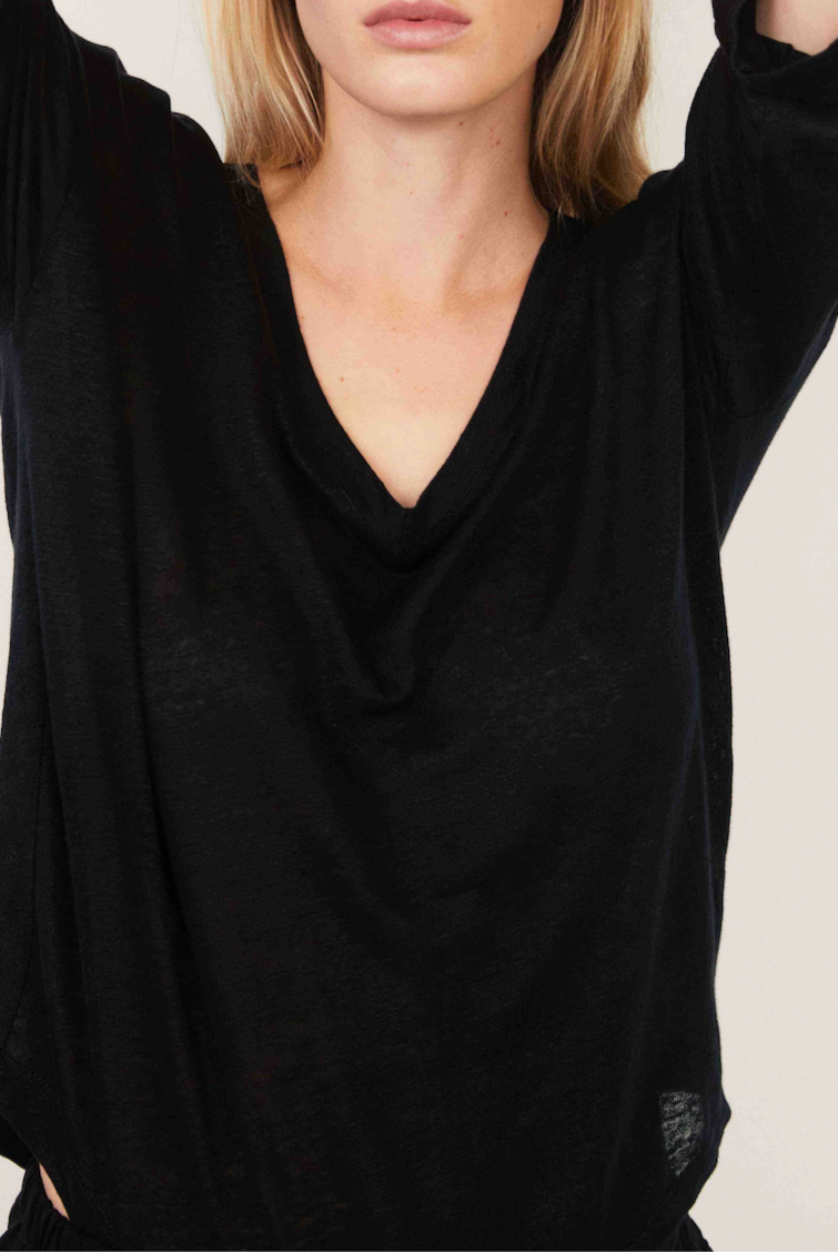 The Iris linen v-neck shirt in essential black on model, 3/4 sleeve sustainable top