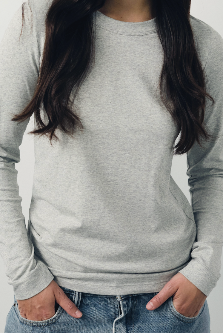 The Nora fitted long sleeve in grey melange on model, organic cotton with stretch