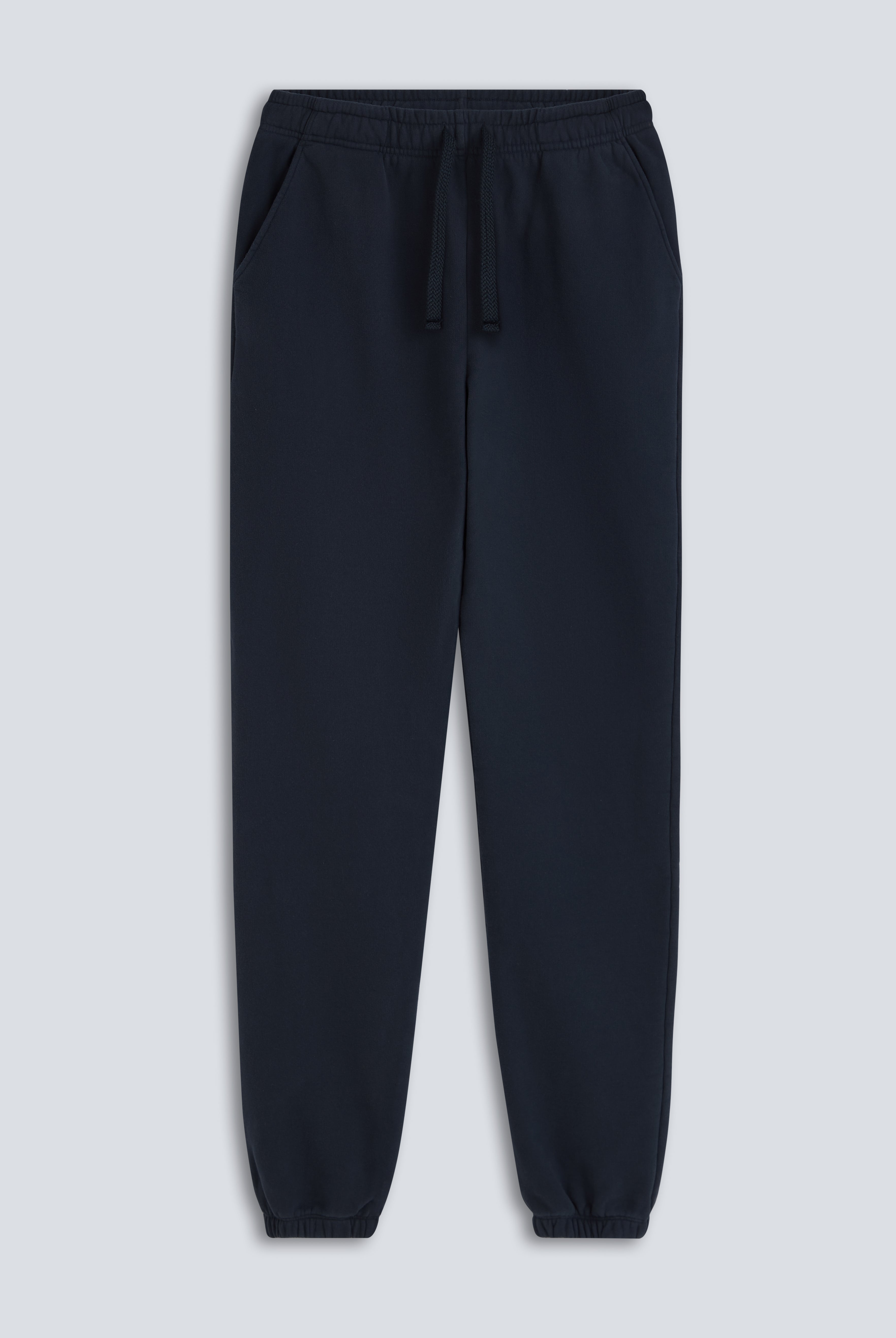 The Abby tapered sweatpants navy front view, drawstring waist, 100% organic cotton fleece made in Portugal