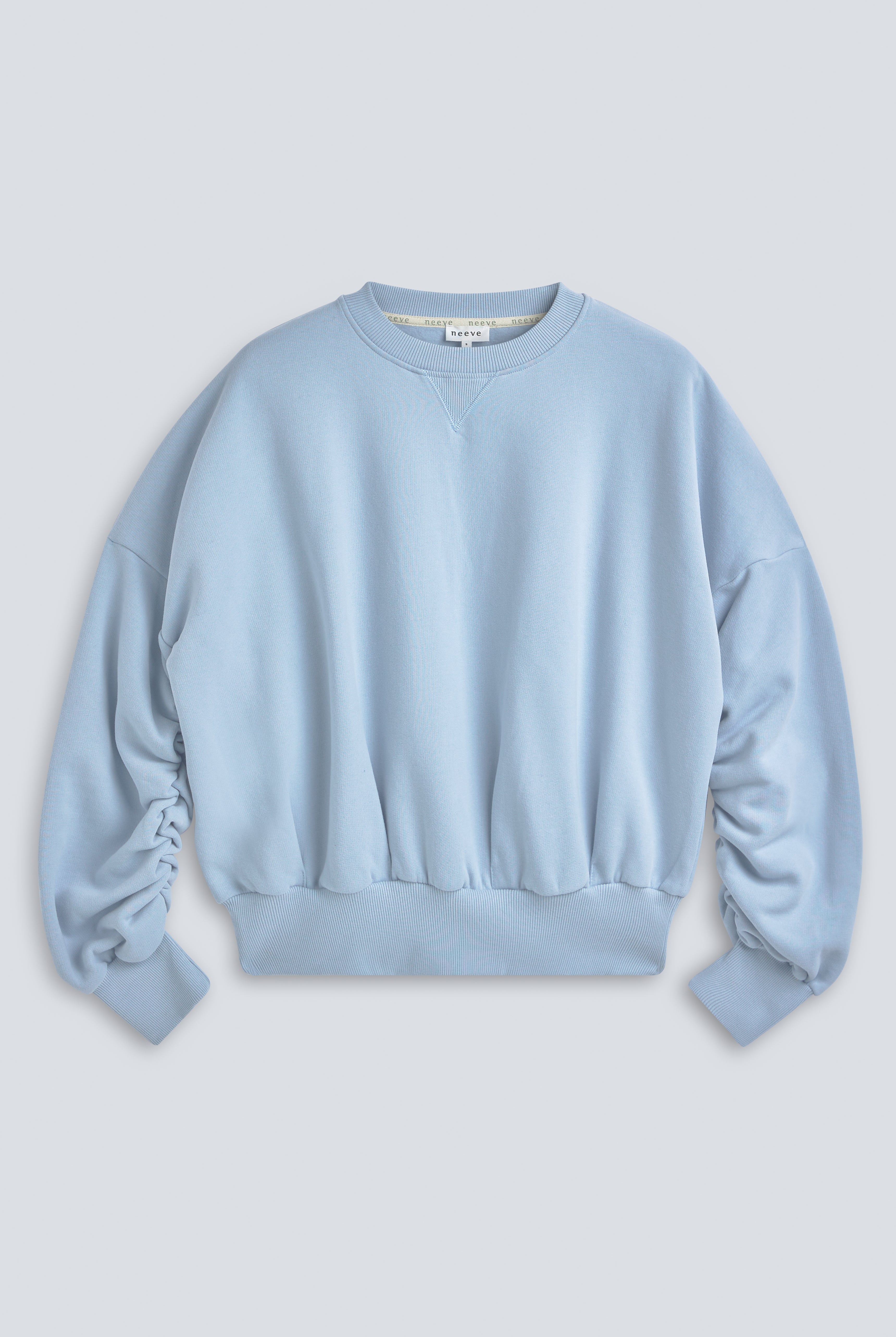 The Blake cropped sweatshirt blue fog front view, 100% organic cotton fleece made in Portugal