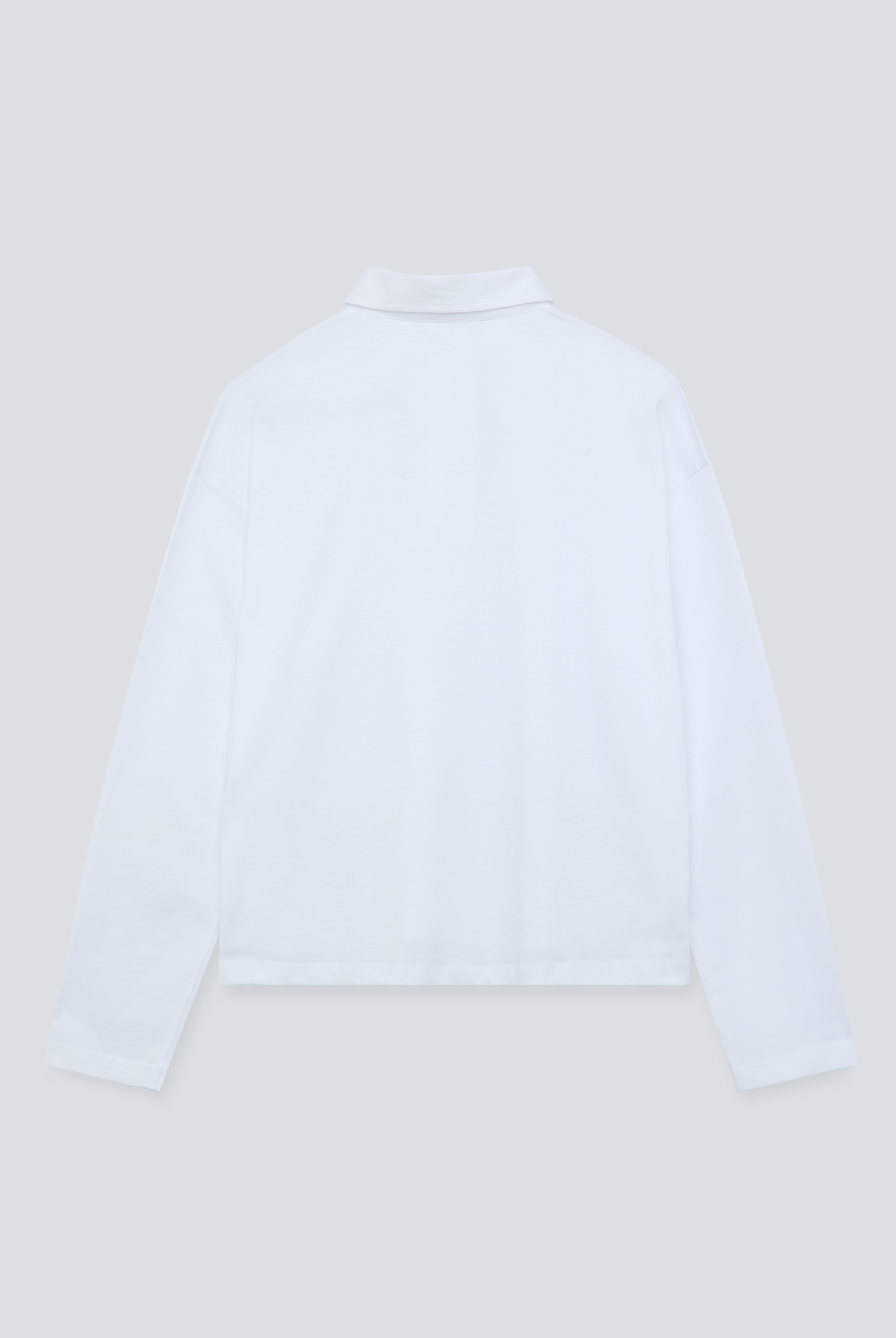 The Charlie in Crispy White. Polo long sleeve, 180 grams. 100% organic cotton. GOTS. Back view.
