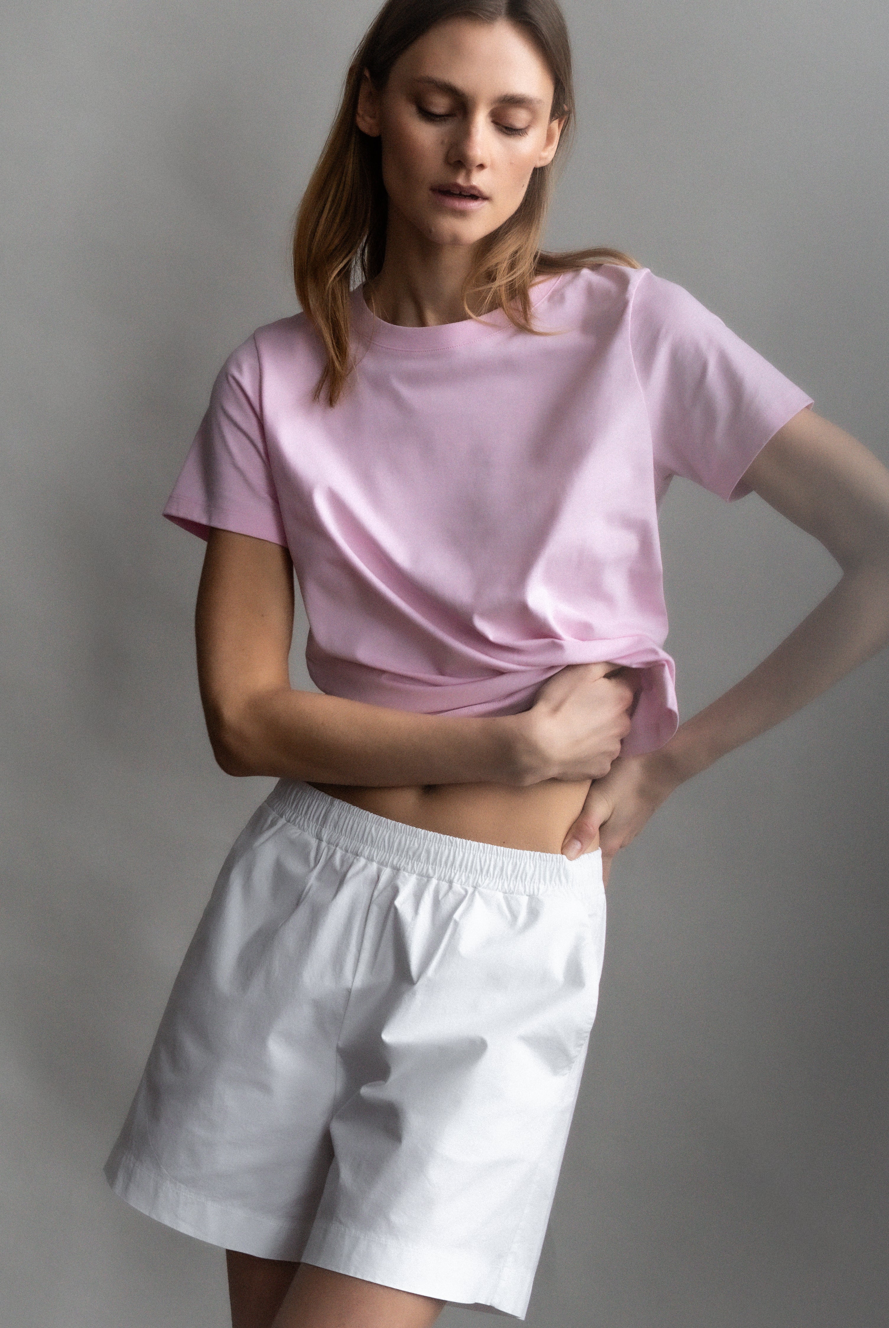 The Lux in Crispy White. 97% pima cotton with 3% elastane. Shown on model with The Jill in Rose Pink.