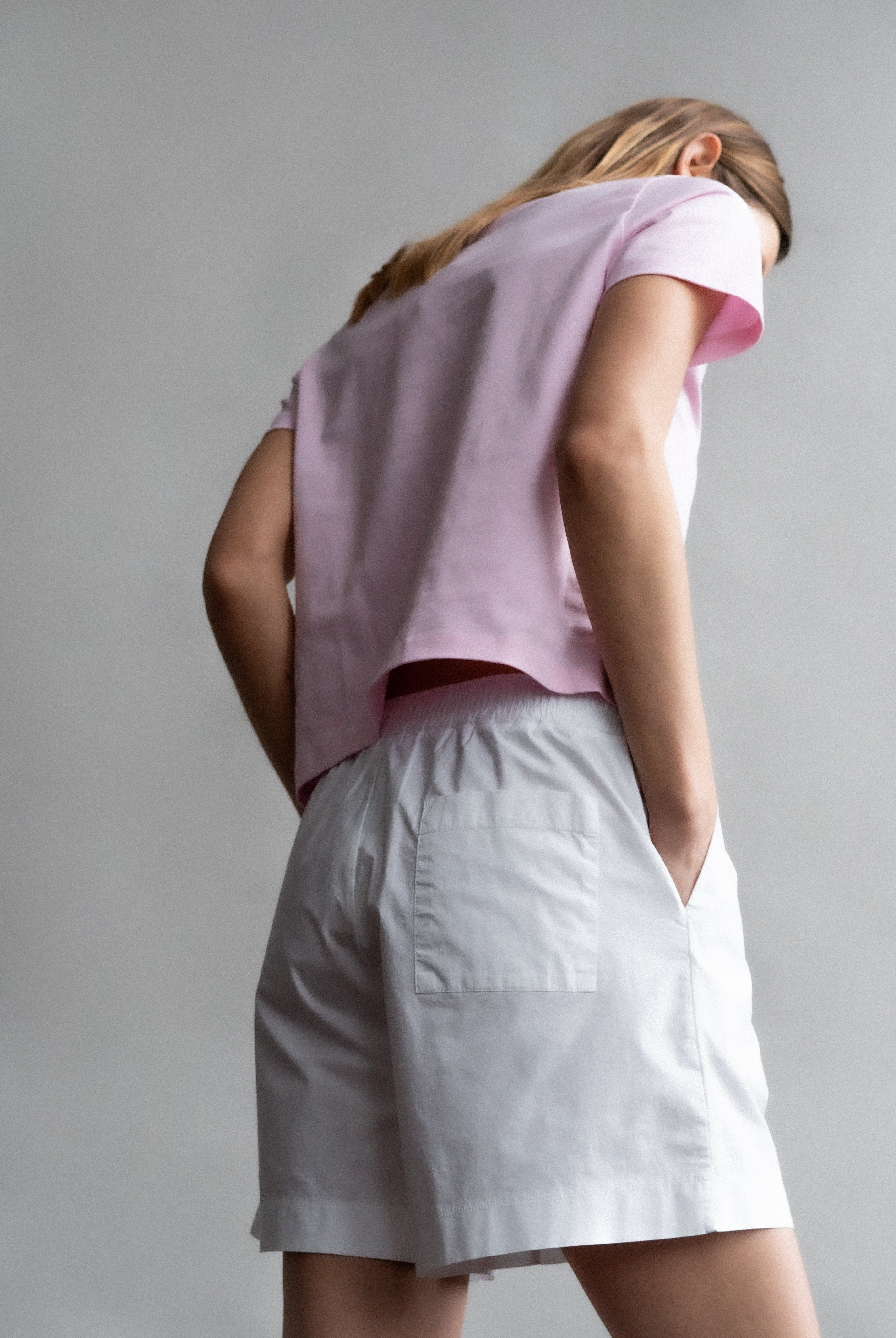 The Lux in Crispy White. 97% pima cotton with 3% elastane. Shown on model with The Jill in Rose Pink.