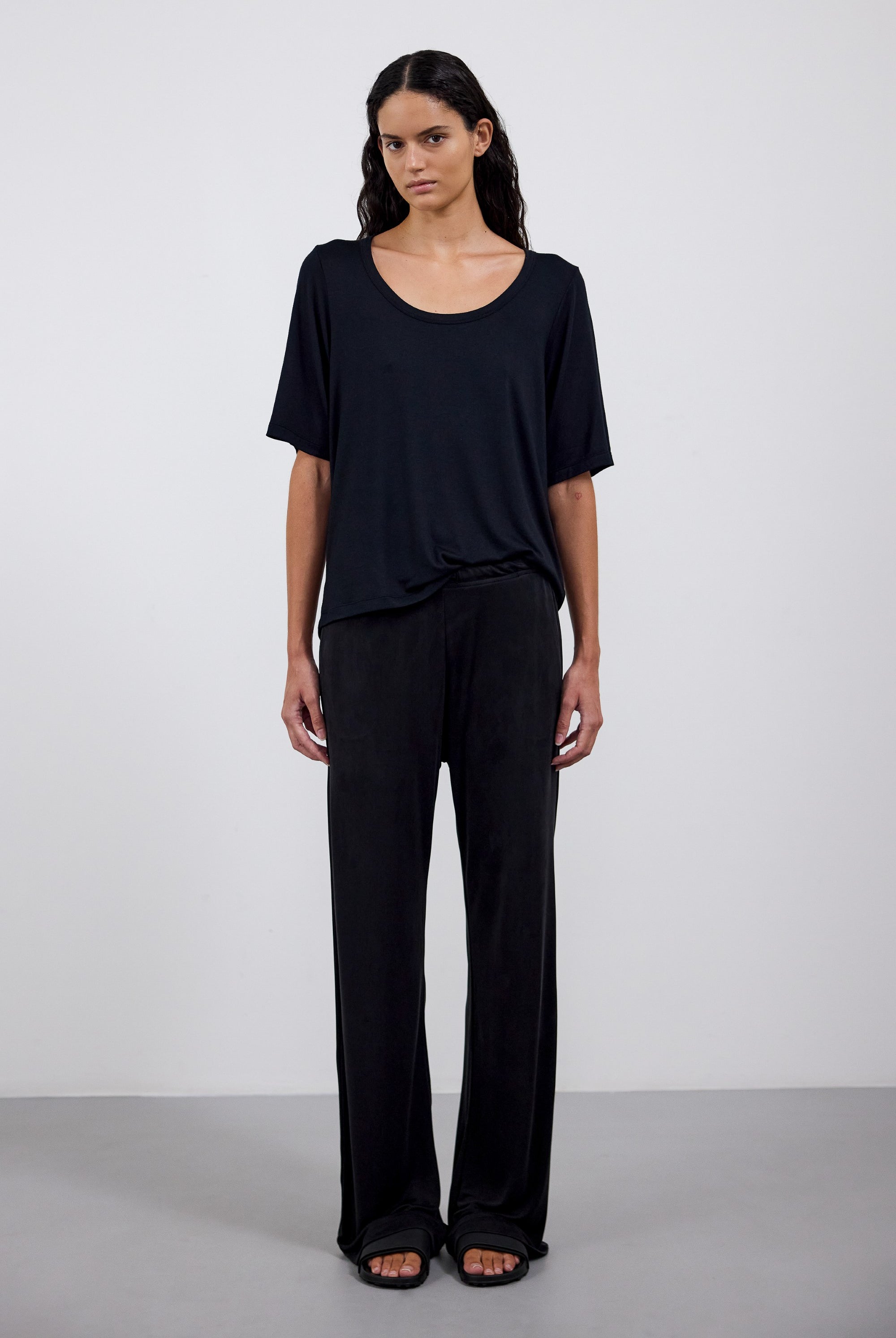 The Mare in Essential Black. 95% Micromodal with 5% elastane. Shown on model with The Sam in Essential Black.