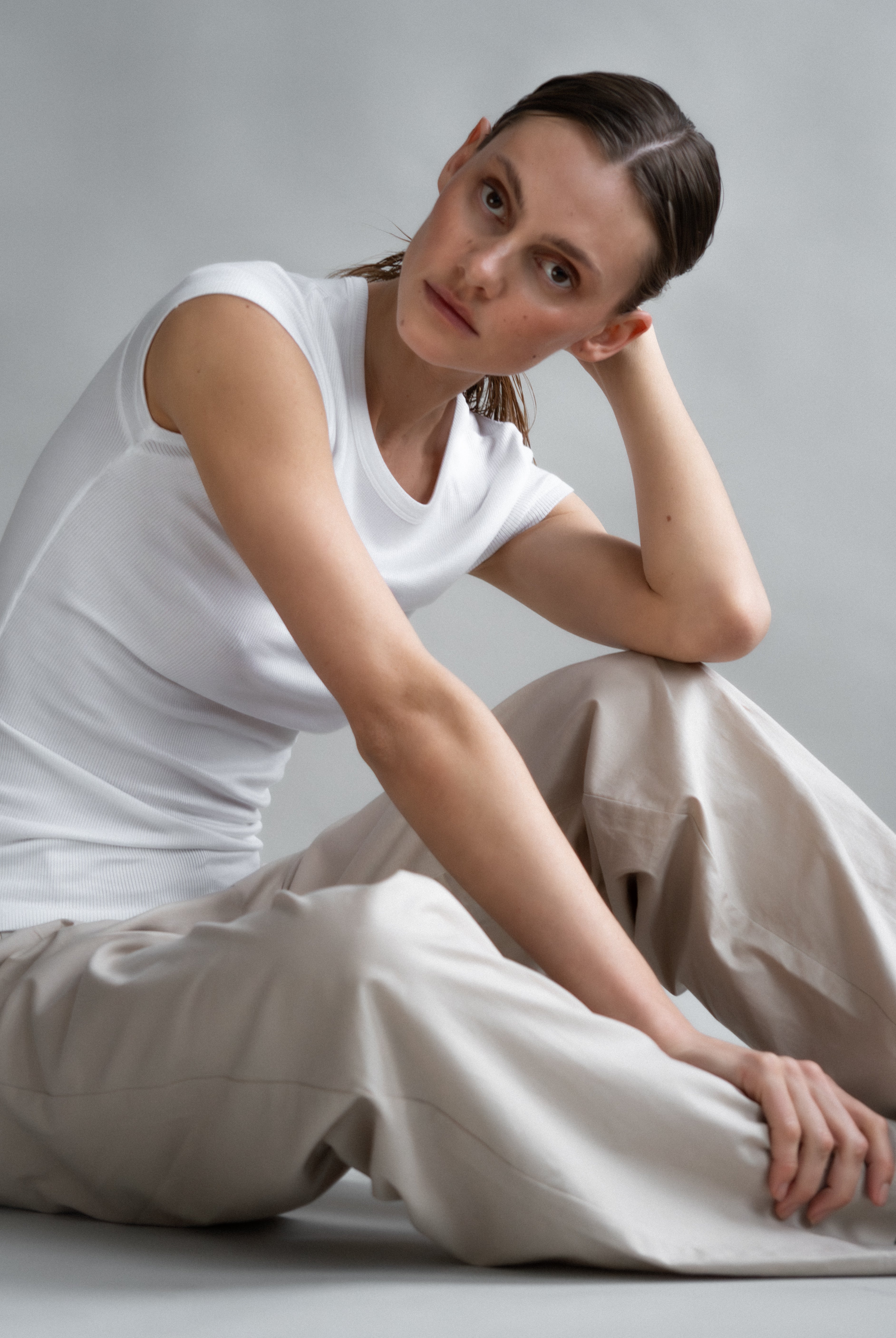 The Mika Crispy White cap sleeve top in crispy white shown on model. Ribbed modal fabric