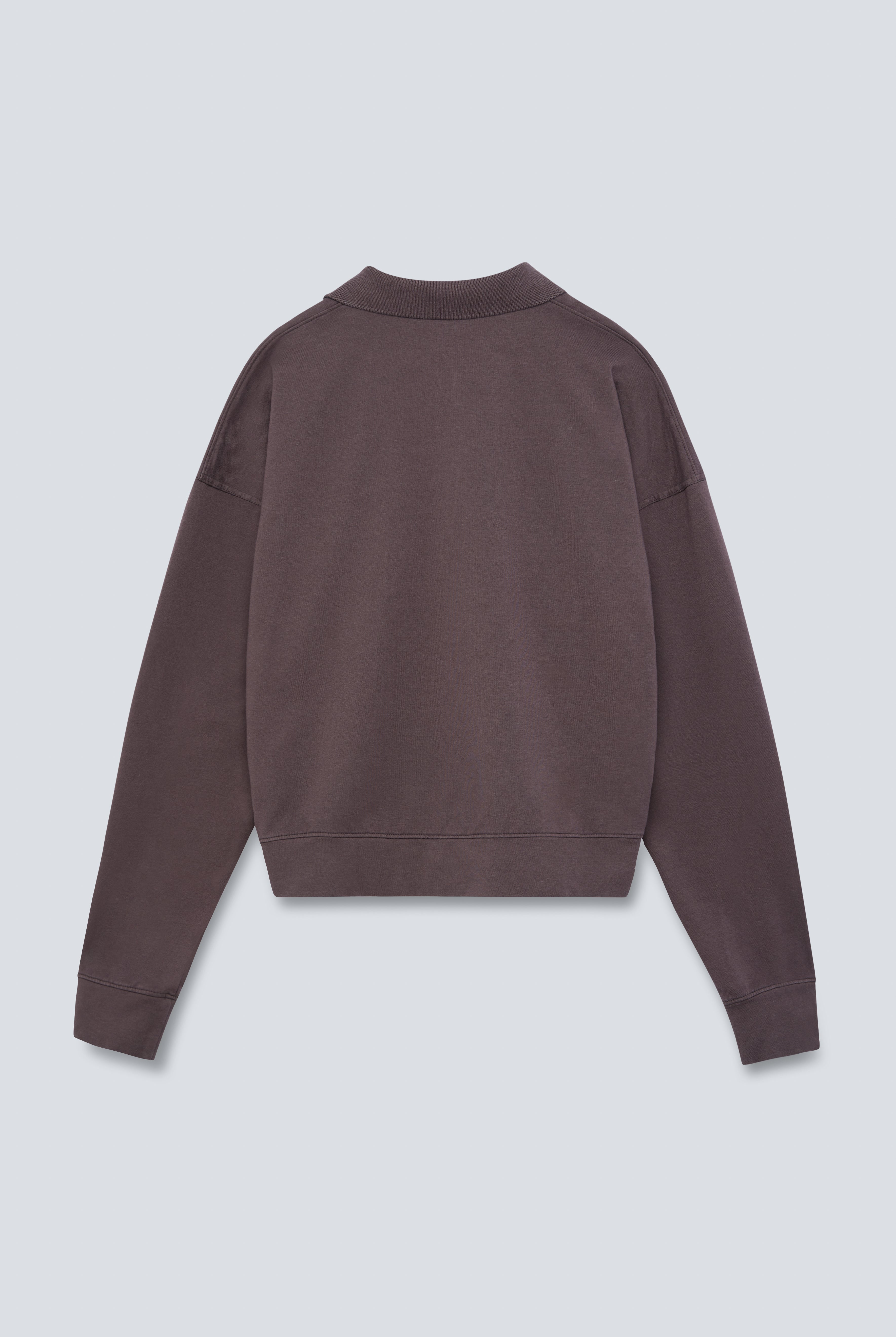 The Remi in Plum. Polo long sleeve and a boxy shape. Made from 100% organic cotton babyfleece. GOTS. Back view.