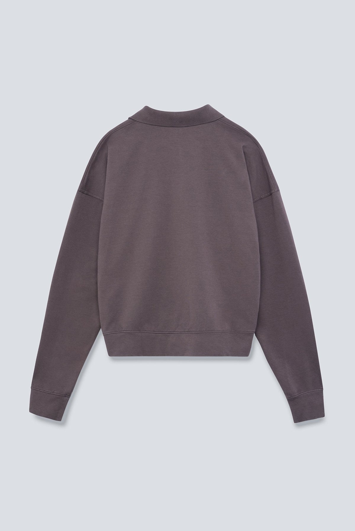 The Remi in Plum. Polo long sleeve with a boxy shape. Made from 100% organic cotton babyfleece. Back view.