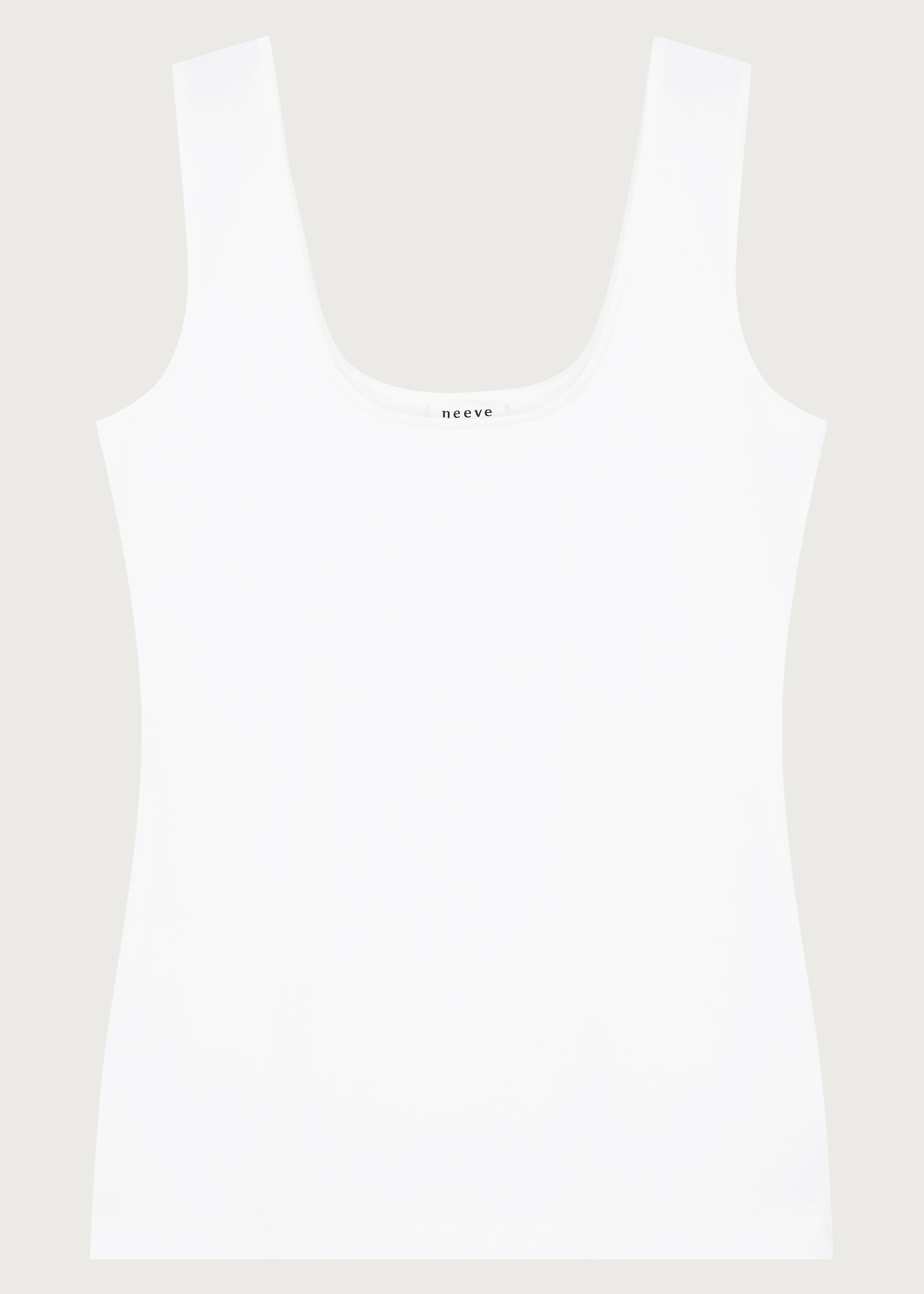 The Uma top in off-white on model, 95% organic cotton 5% elastane