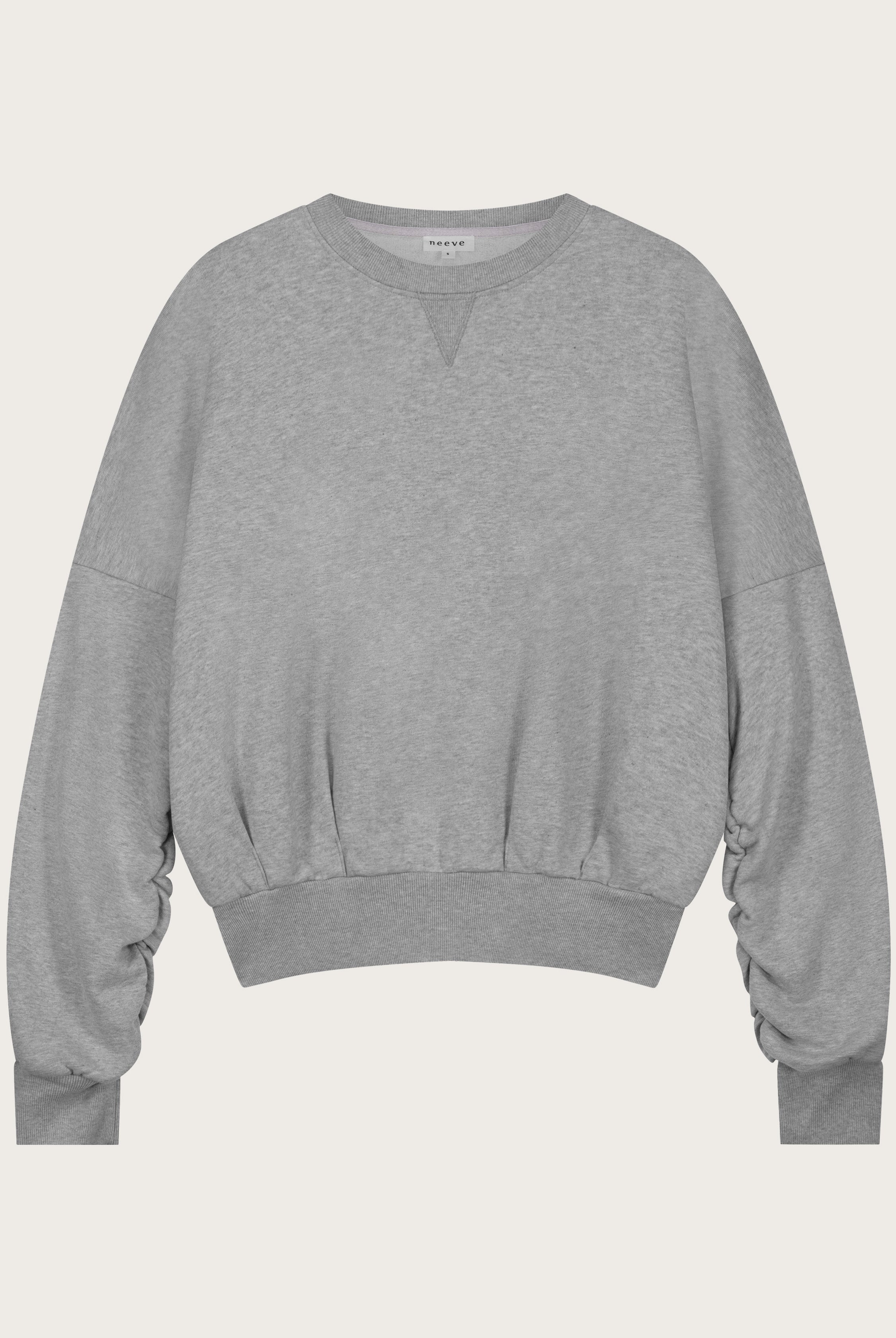 The Blake cropped sweatshirt in grey melange front view, twisted sleeve detail, organic cotton fleece