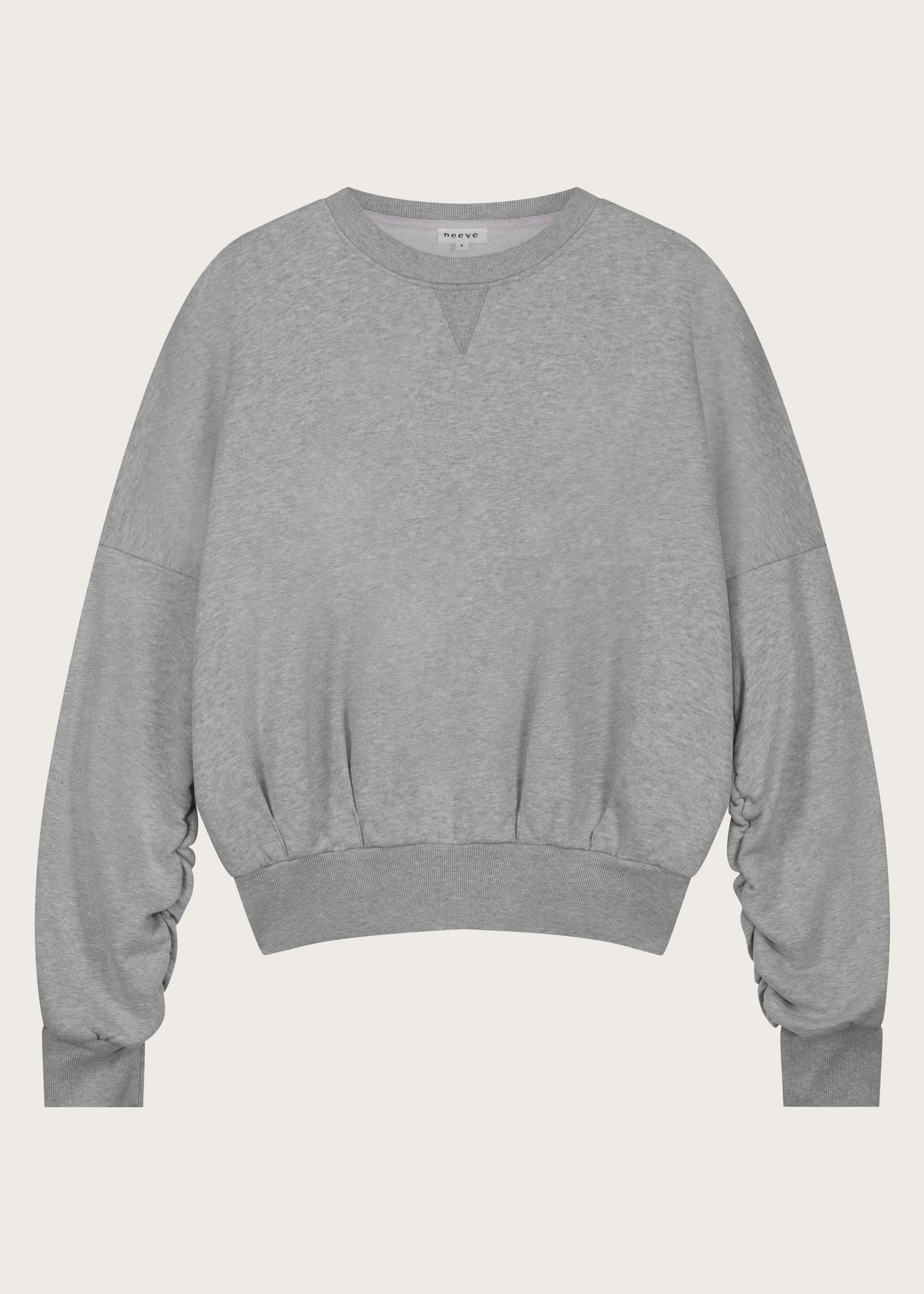 The Blake cropped sweatshirt in grey melange front view, twisted sleeve detail, organic cotton fleece