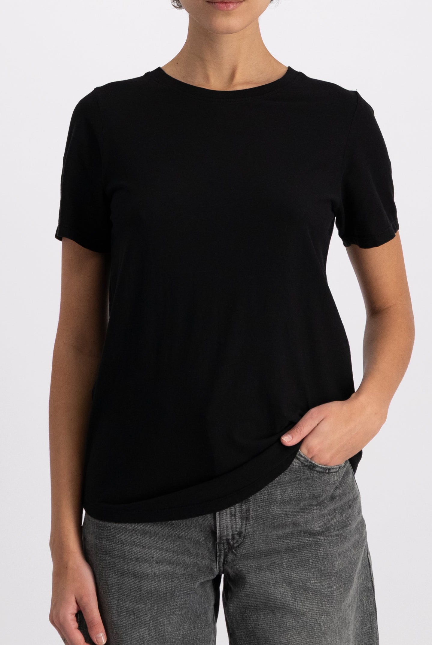 The Michelle crew-neck t-shirt in essential black shown on model, GOTS certified organic cotton