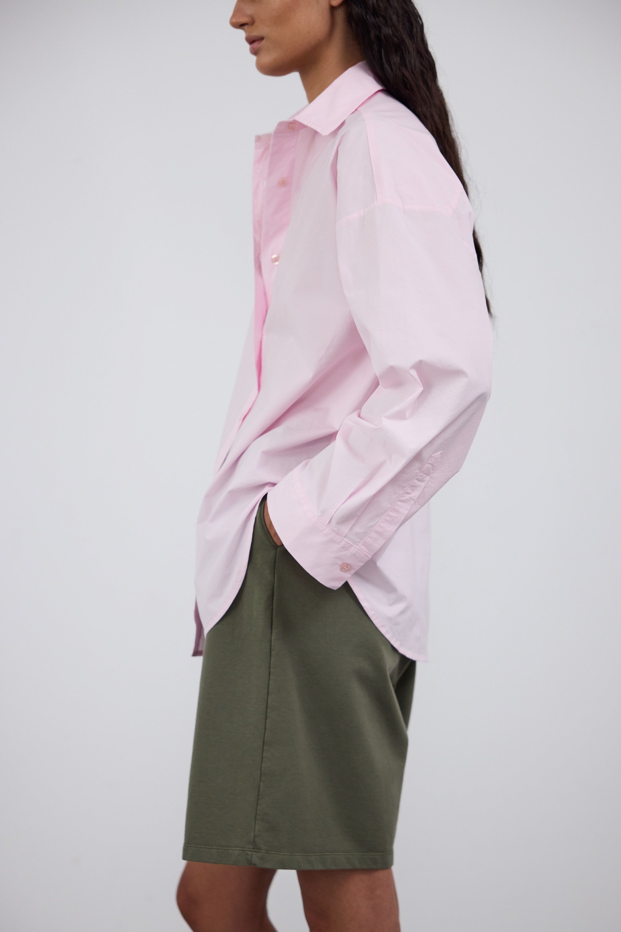 The Posey in Olive. 100% organic cotton babyfleece. GOTS certified. Shown on model with The Lune in Rose Pink. 