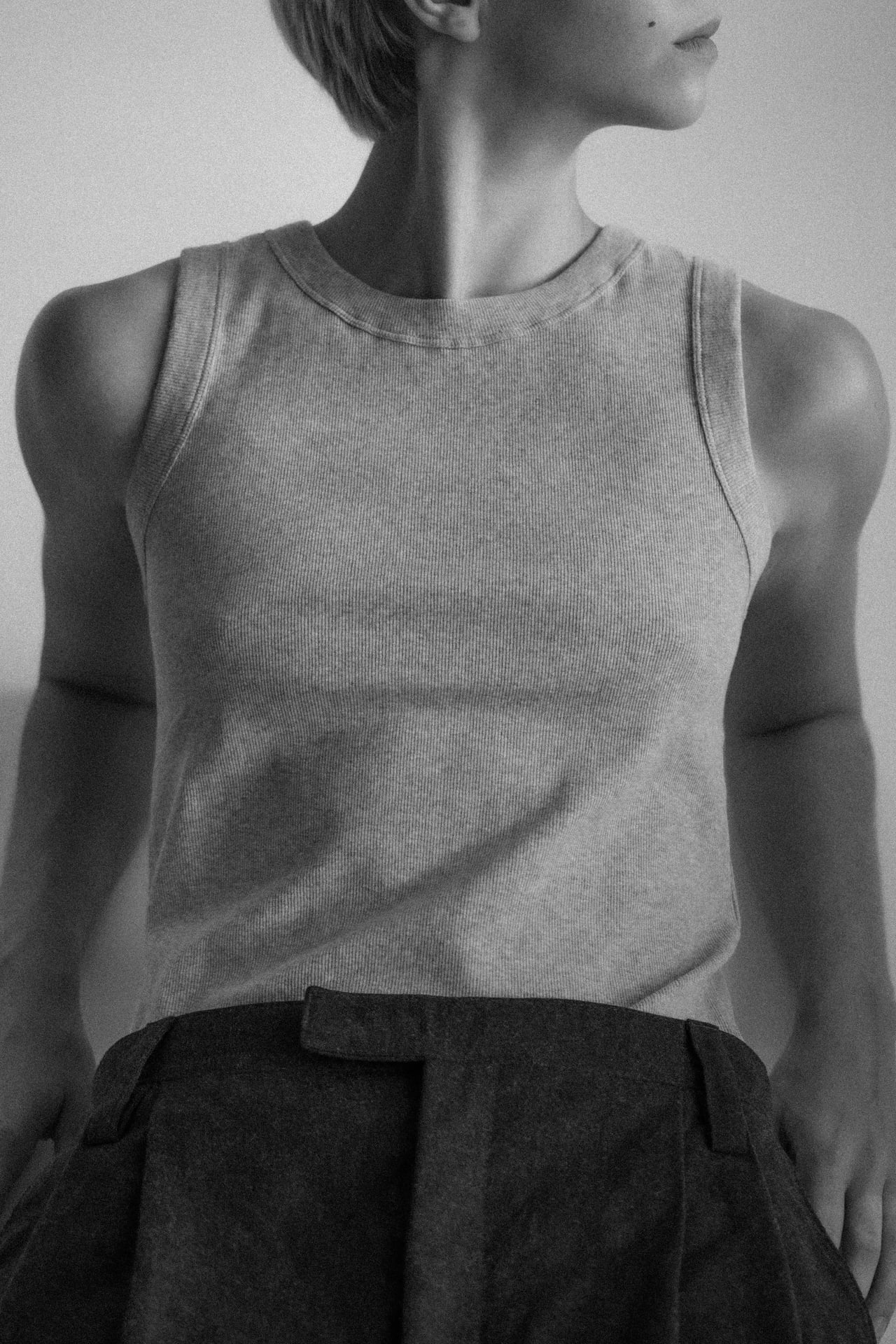 The Rania beige melange, ribbed tank, organic cotton, shown on model 