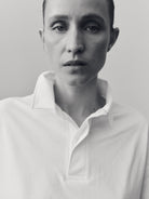 The Charlie in Crispy White. Polo long sleeve, 180 grams. 100% organic cotton. GOTS. Collar detail. Shown on model. 