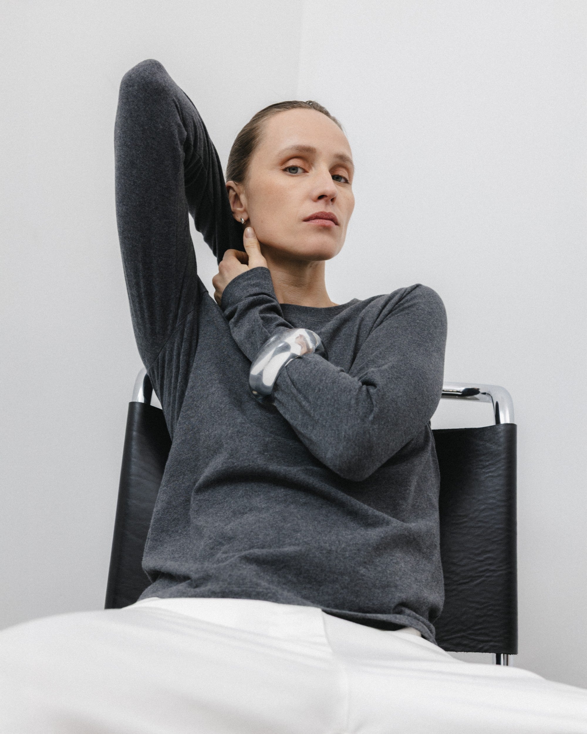 The Nora long sleeve in Anthracite. Made from 95% organic cotton with 5% elastane. Brushed outside. Shown on model view. GOTS