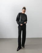 The Sam in Essential Black. 100% Lyocell.  Shown on model with The May in Pitch Black. 