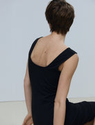 The Nelly little black dress on model, 95% organic cotton 5% elastane