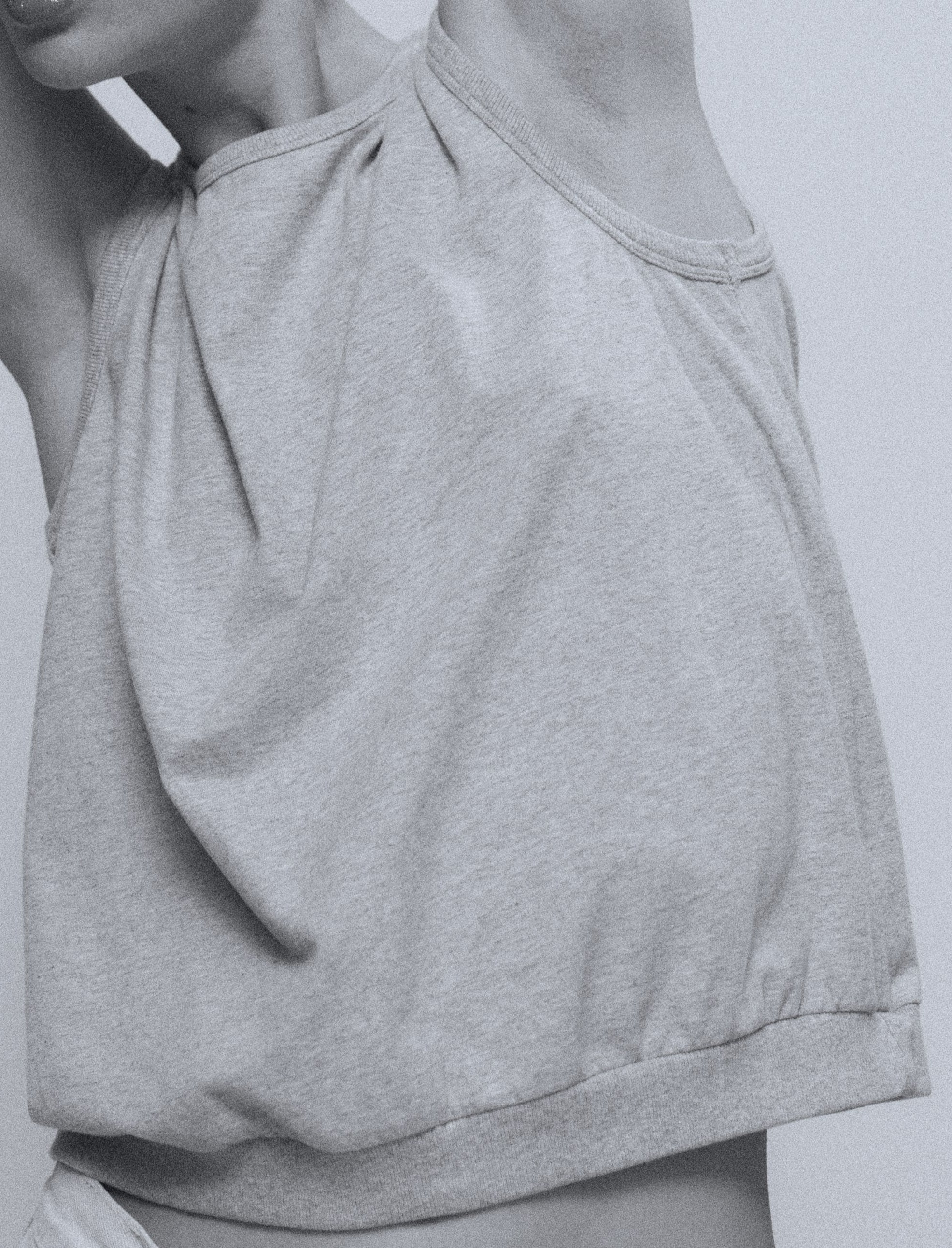 The Noémi tank top in grey melange on model, GOTS certified organic cotton