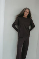 The Riley in Plum. Wide-leg trousers, 100% organic cotton babyfleece.