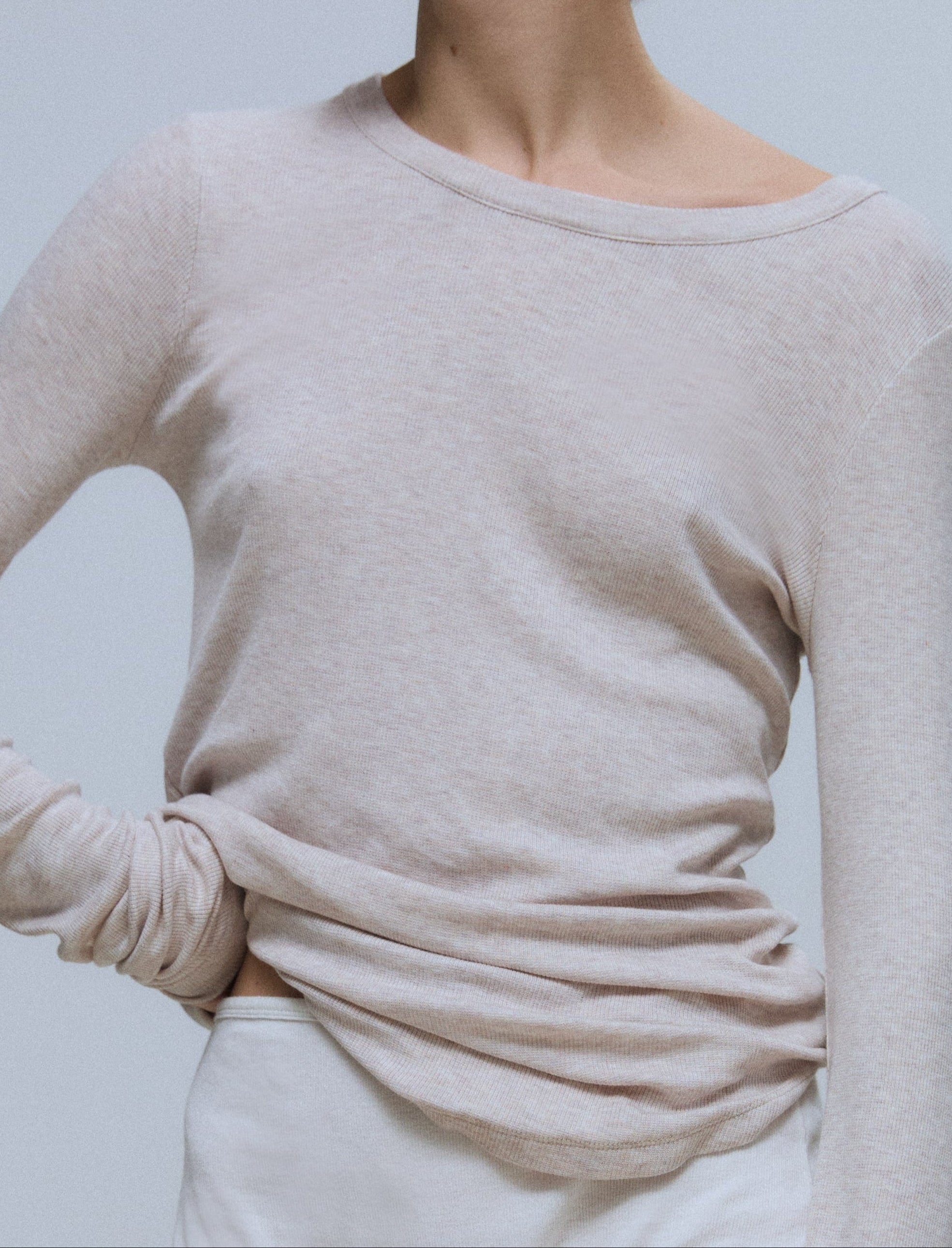 The Georgia beige melange on model, weightless fitted silhouette