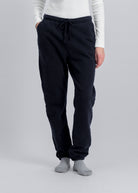 The Abby navy sweatpants front view on model, brushed organic cotton