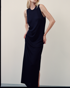 The Leanne dress in essential black on model, 95% organic cotton 5% elastane GOTS certified made in Portugal