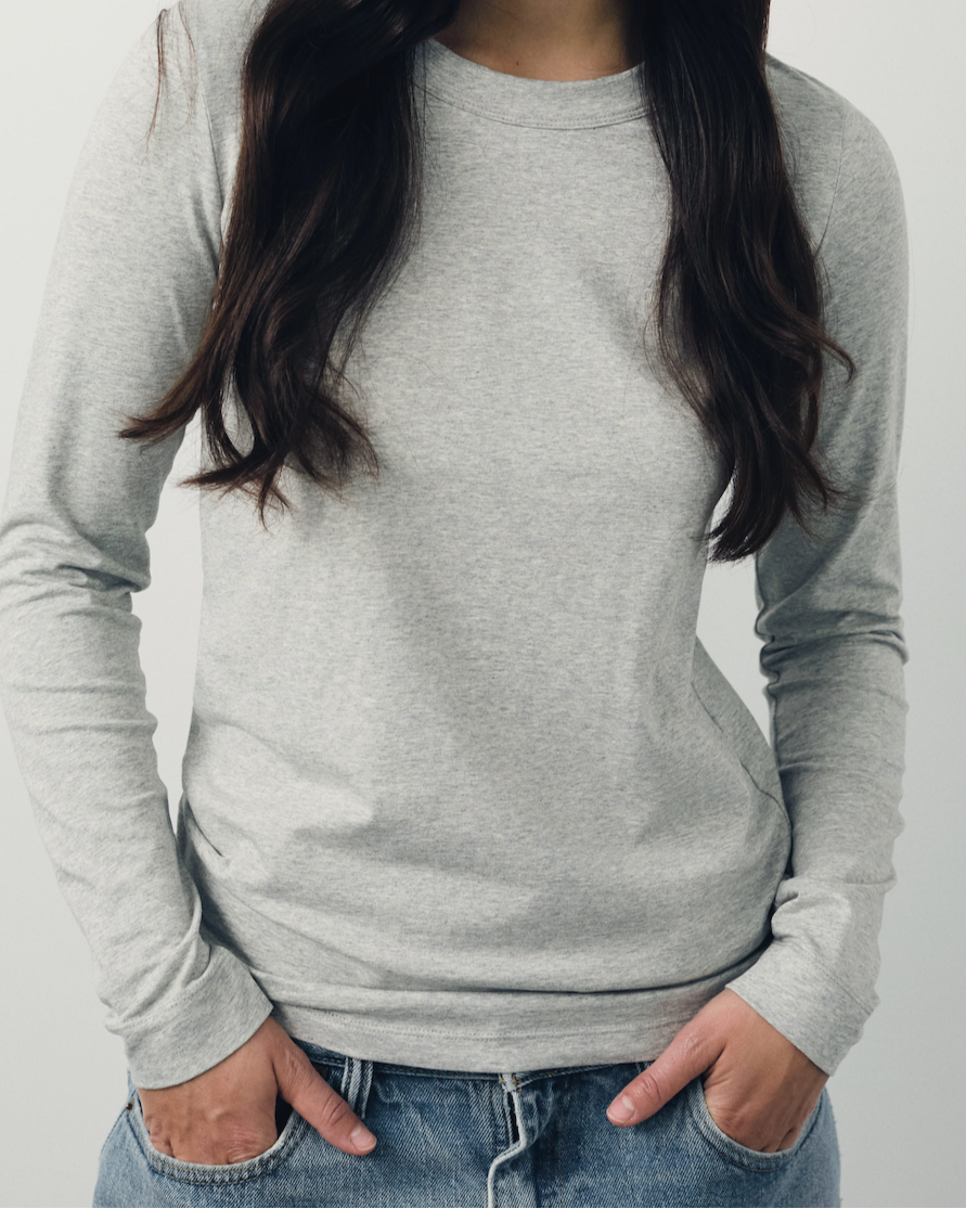 The Nora fitted long sleeve in grey melange on model, organic cotton with stretch