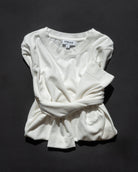 The Nora off-white long sleeve front view, body-skimming fit
