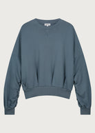 The Blake sweatshirt in stone front view, twisted sleeve detail, 100% organic cotton made in Portugal