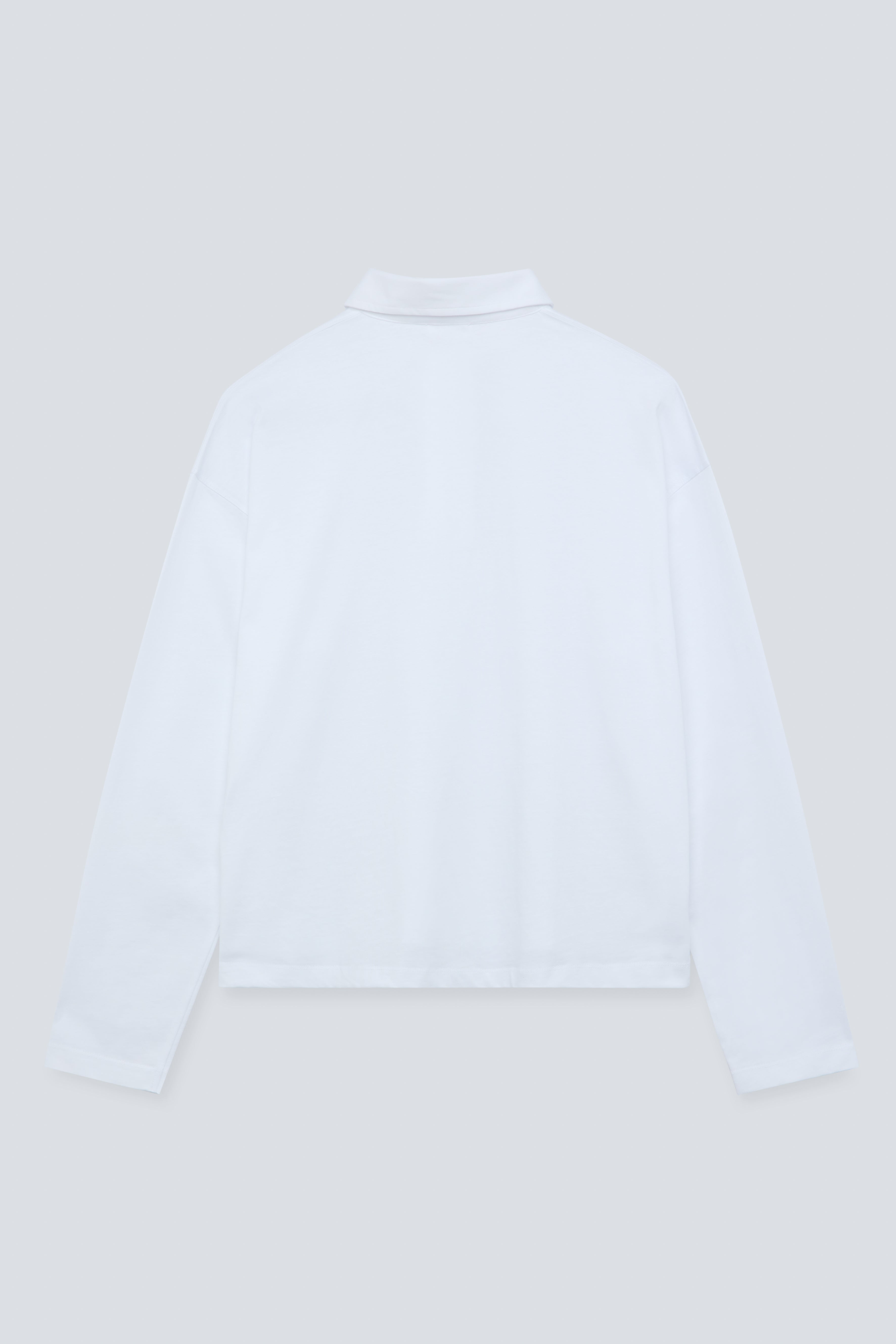 The Charlie in Crispy White. Polo long sleeve, 180 grams. 100% organic cotton. GOTS. Back view. 