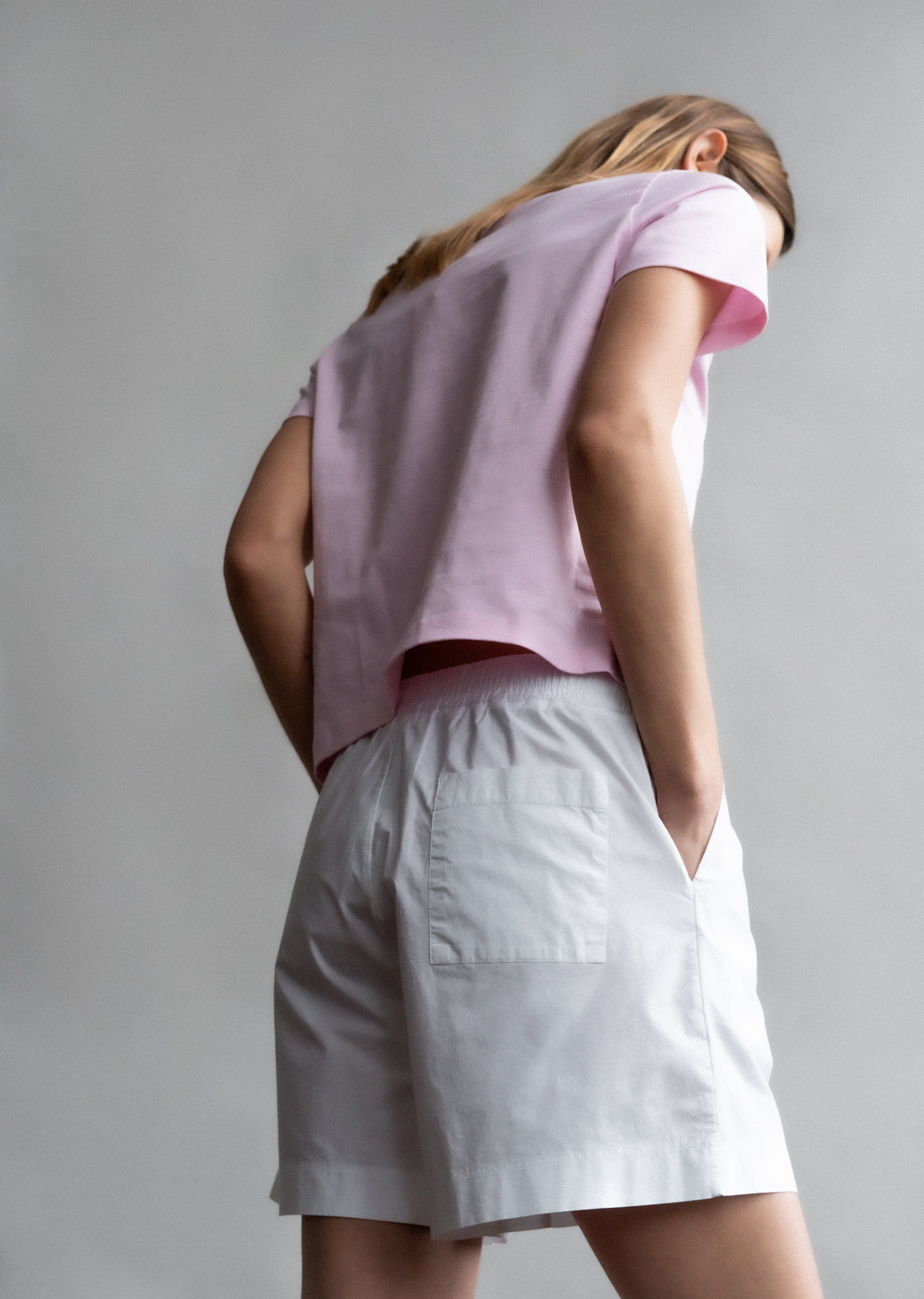 The Jill in Rose Pink. Shown on model. Back view. 180 grams organic cotton. GOTS certified. 