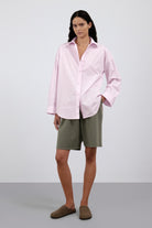 The Lune in Rose Pink. 97% pima cotton with 3% elastane. Shown on model with The Posey in Olive. 