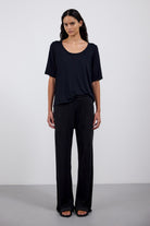 The Mare in Essential Black. 95% Micromodal with 5% elastane. Shown on model with The Sam in Essential Black. 