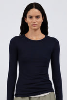 The Max in Essential Black 95% micromodal with 5% elastane. Shown on model. 