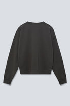 The May in Pitch Black. Crew-neck sweater with a boxy shape. 100% organic cotton babyfleece. GOTS. Back view. 